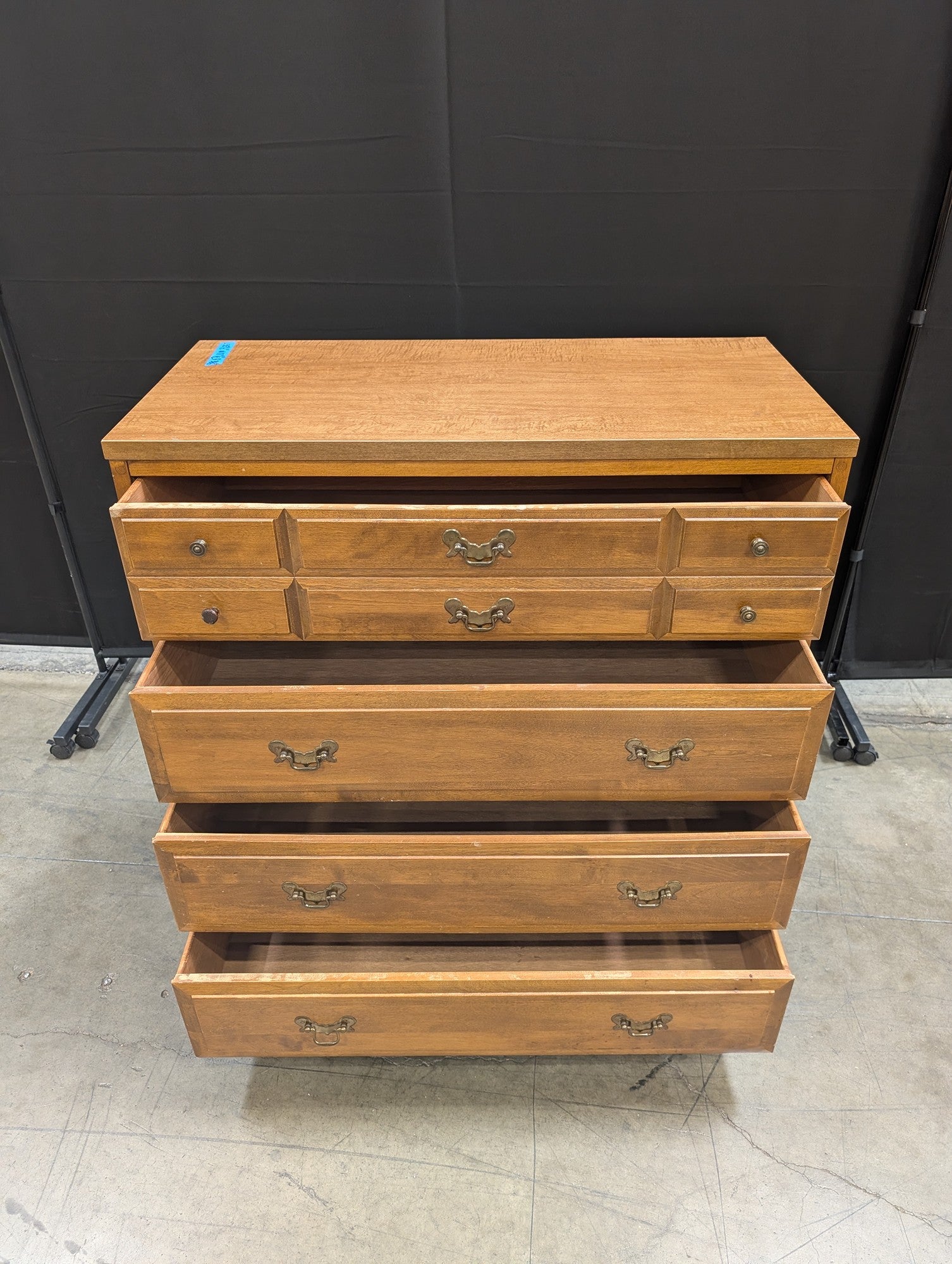 Traditional Brown Wood Chest of Drawers with Ornate Pulls
