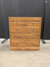 Traditional Brown Wood Chest of Drawers with Ornate Pulls
