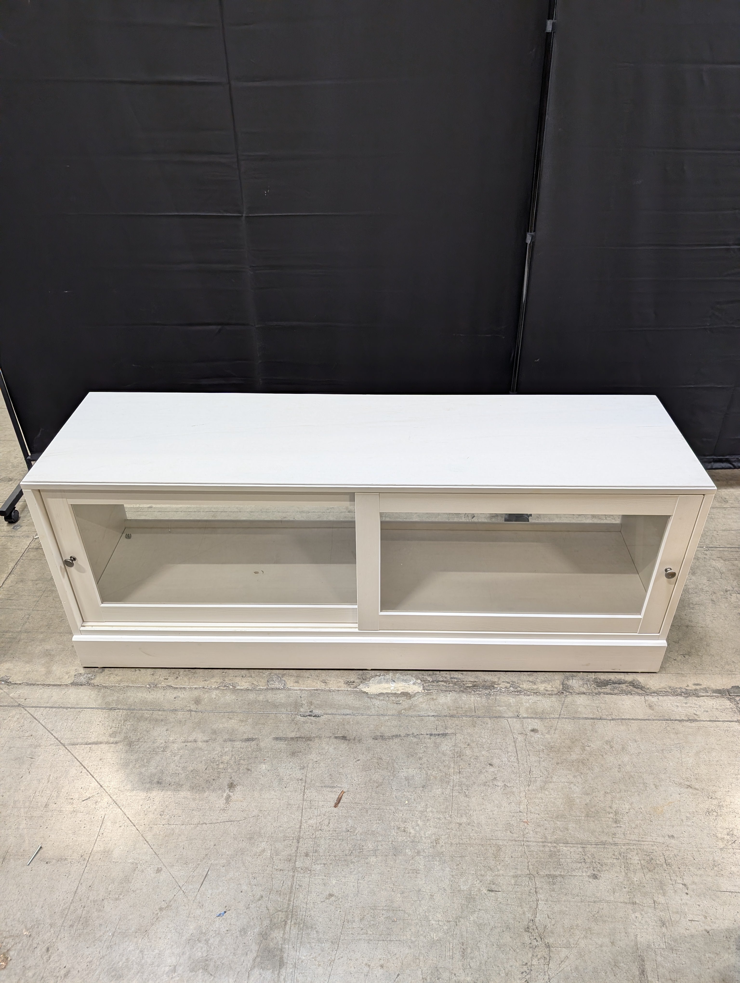 White Media Console with Sliding Glass Door