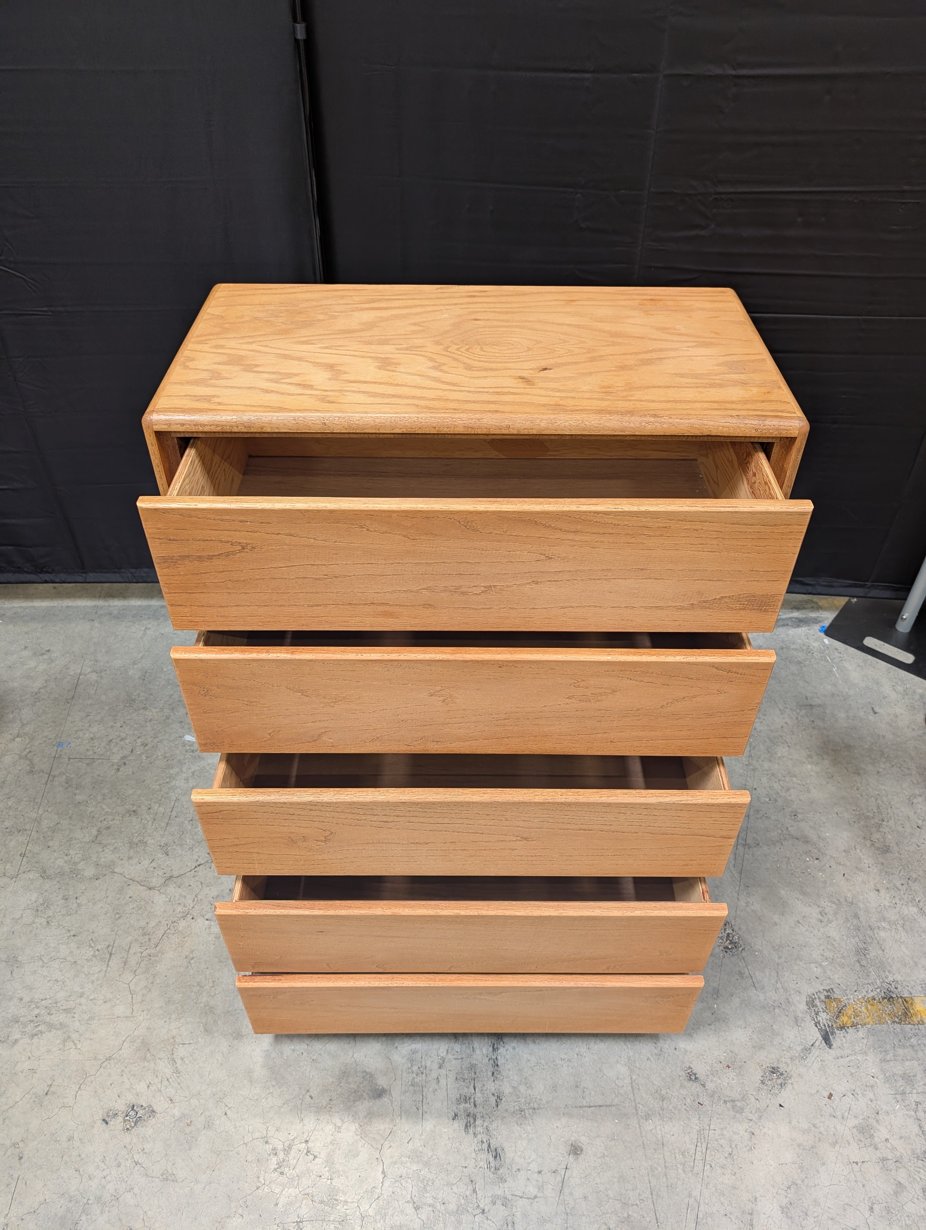 Light Wood Five-Drawer Dresser with Rounded Edges
