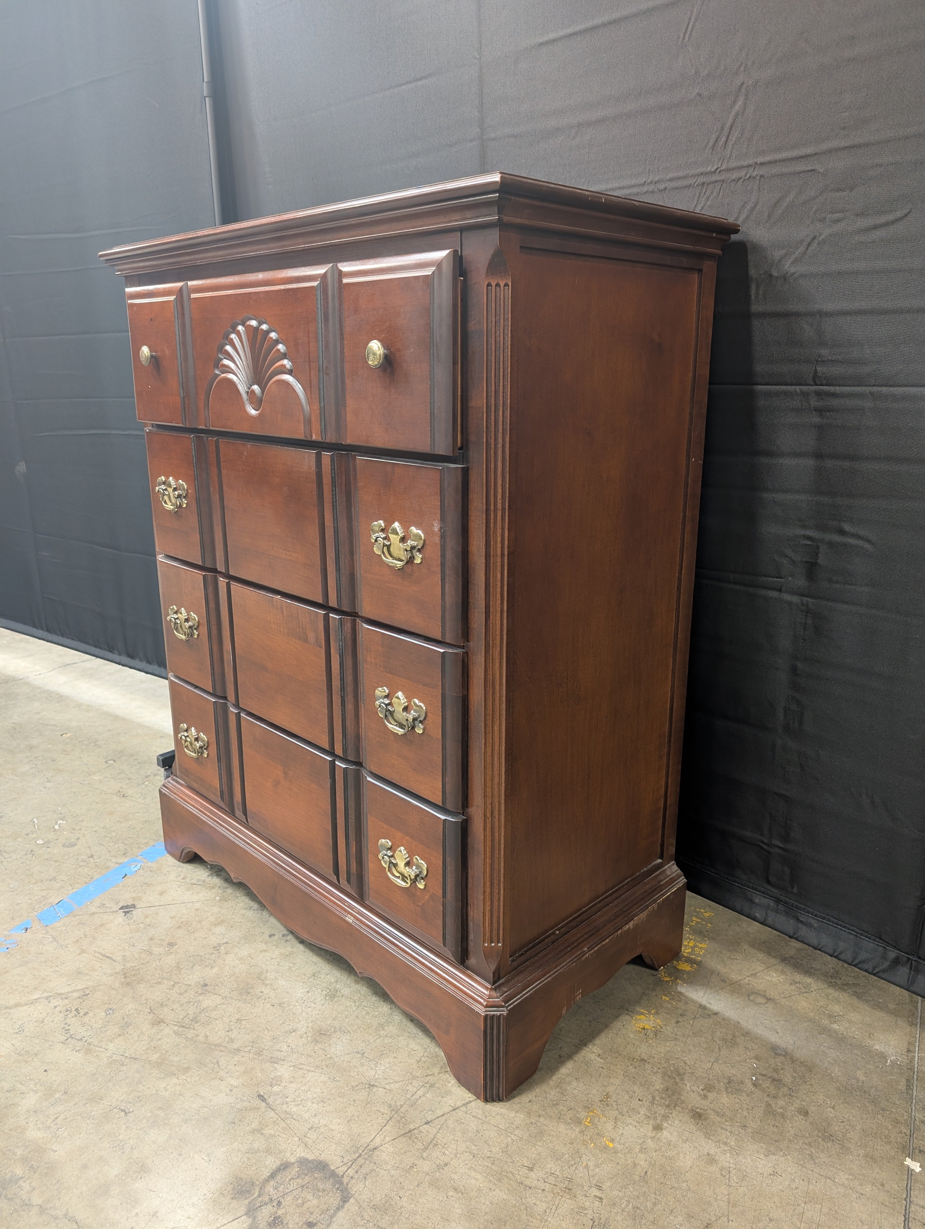 Traditional Dark Wood Dresser with Ornate Hardware