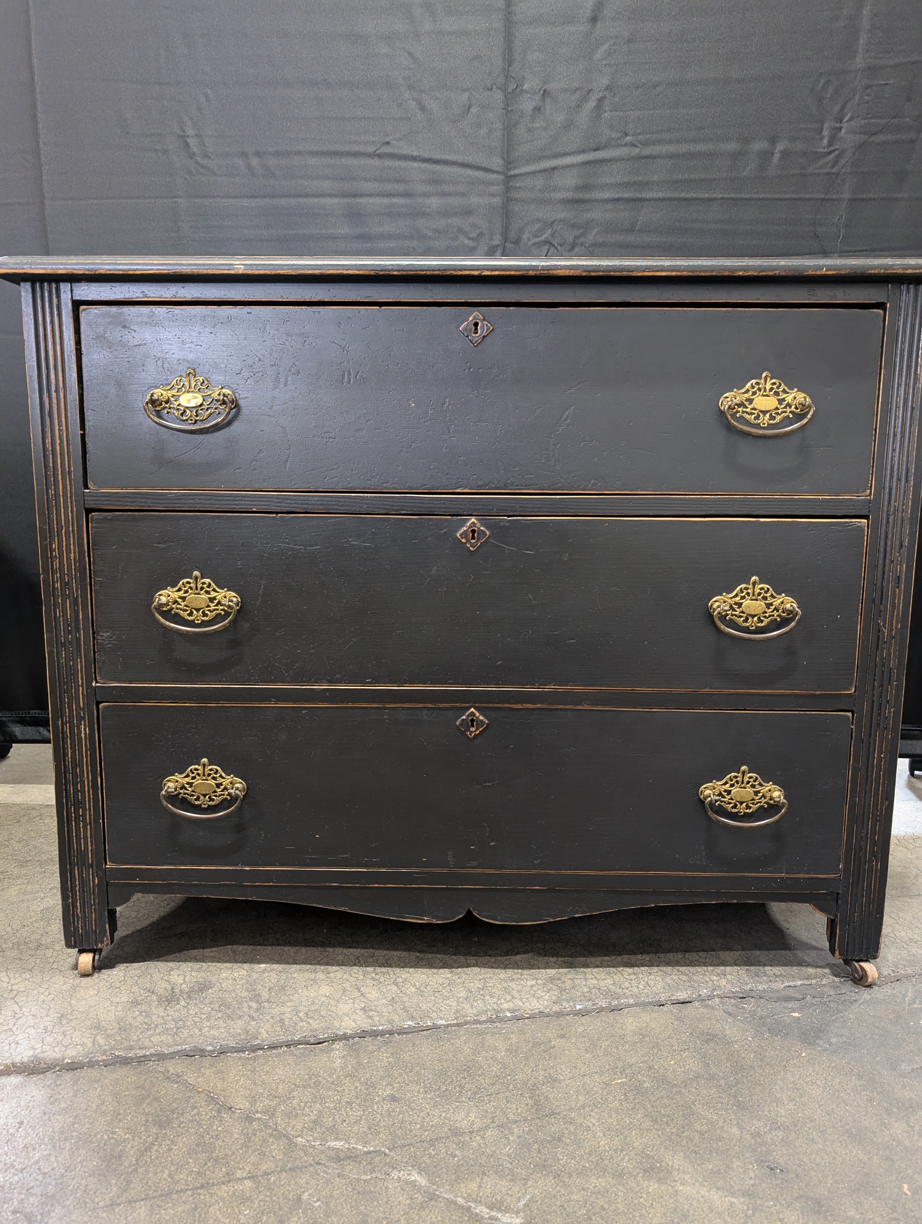 Vintage Black Wood Three-Drawer Chest with Ornate Brass Hardware