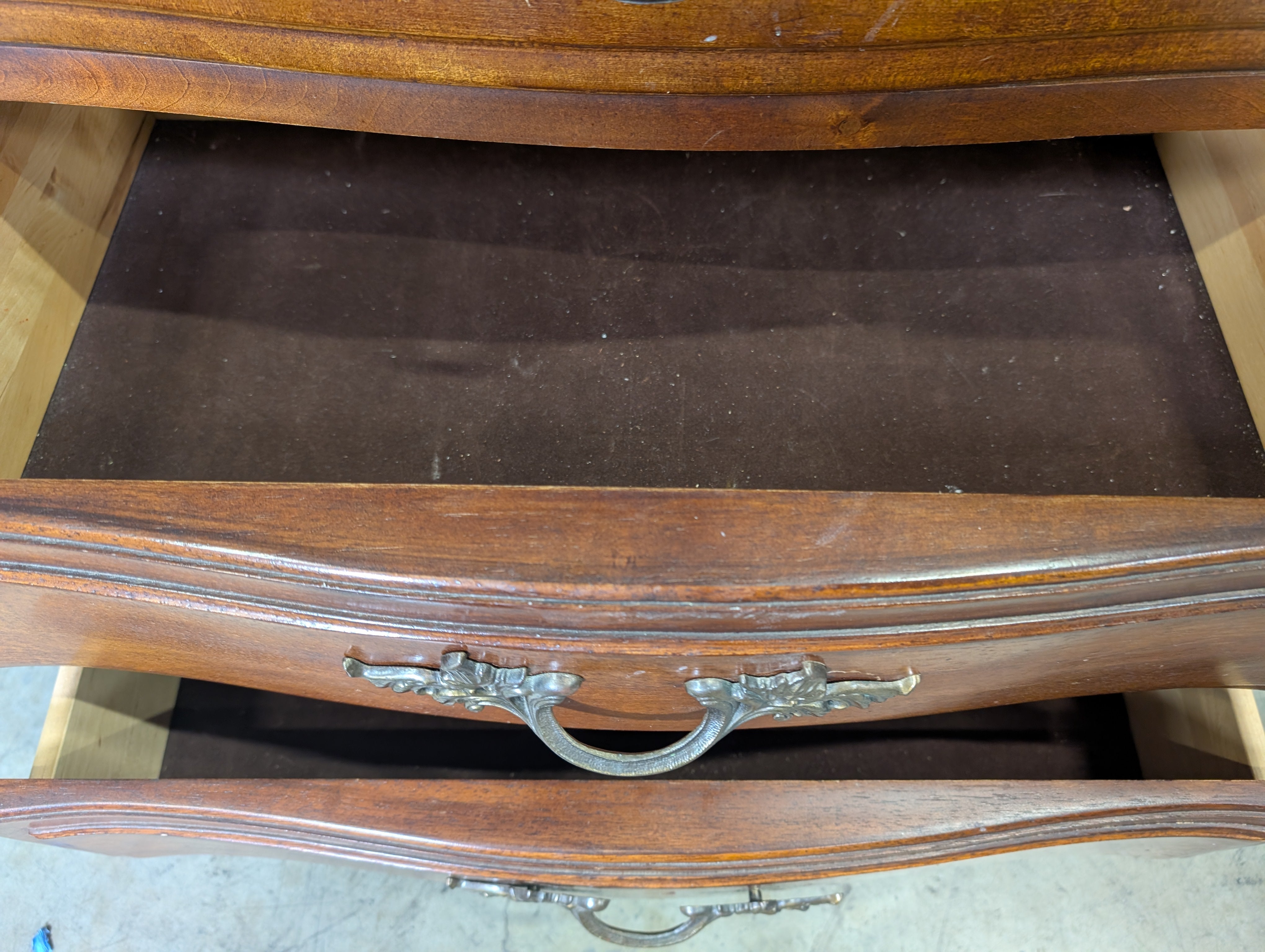 Traditional Cherry Stained Wood Dresser with Ornate Hardware