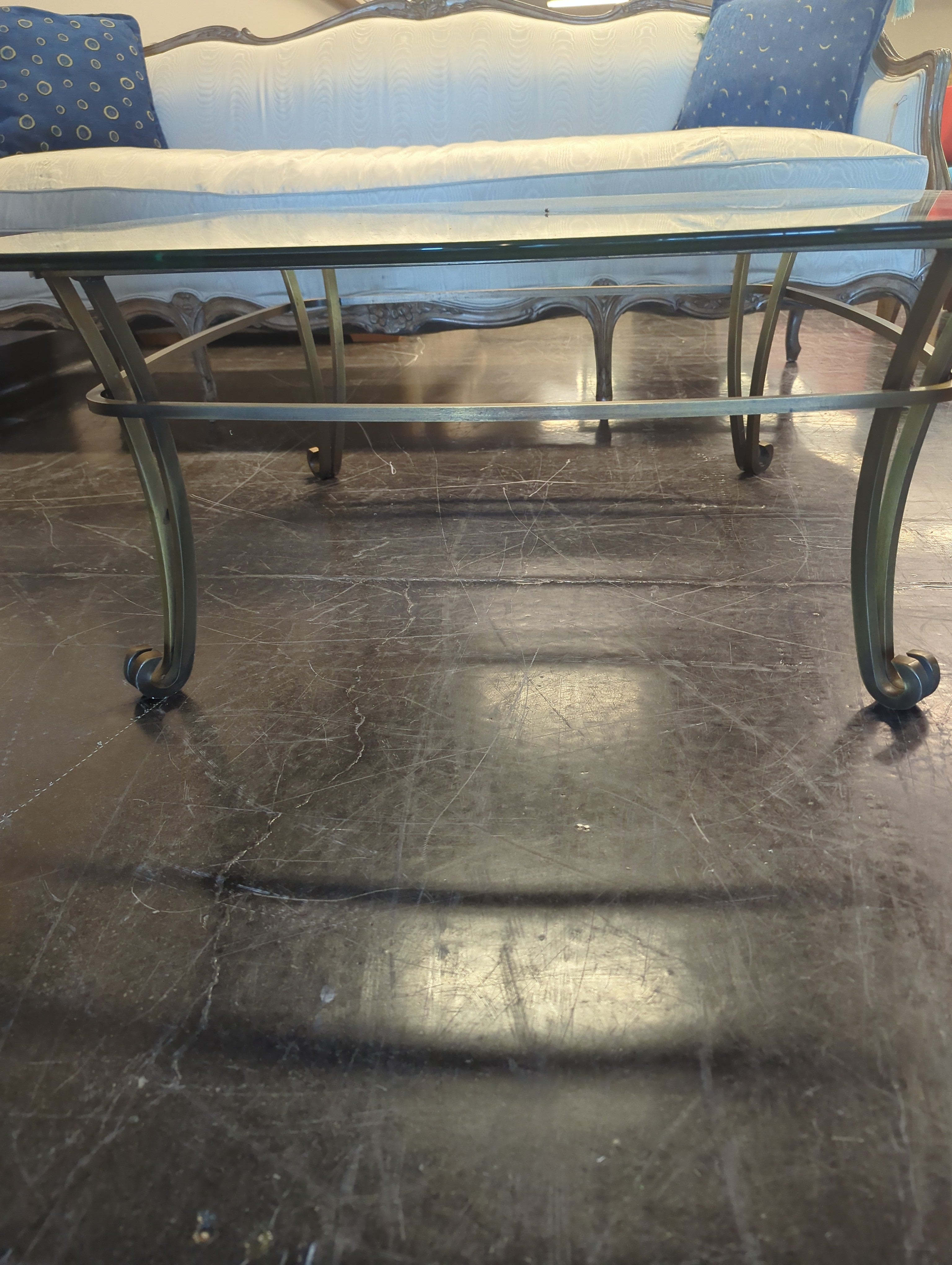 Sophisticated Glass Top Coffee Table with Brass Frame