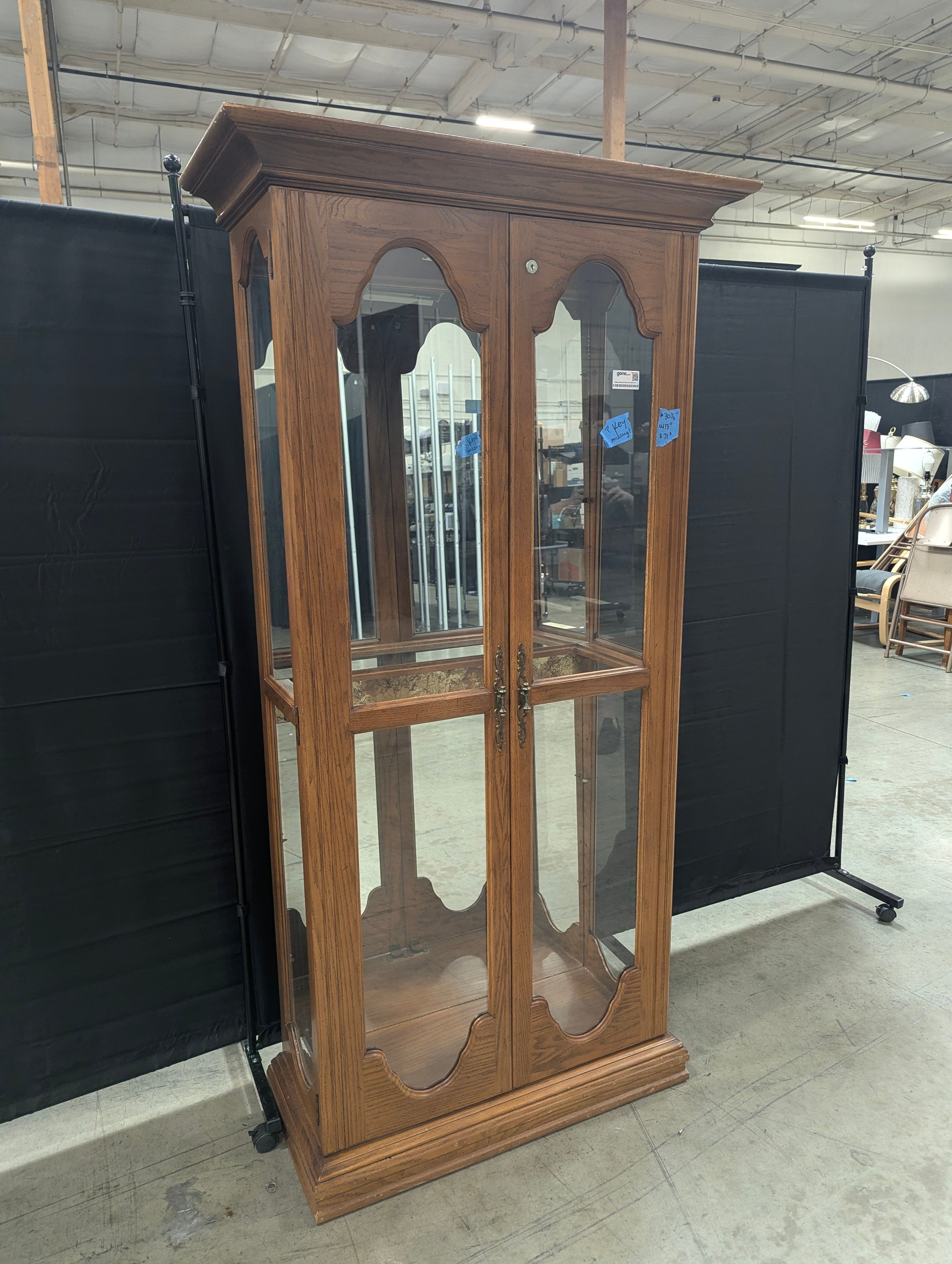 Traditional Wood and Glass Curio Cabinet with Arched Doors