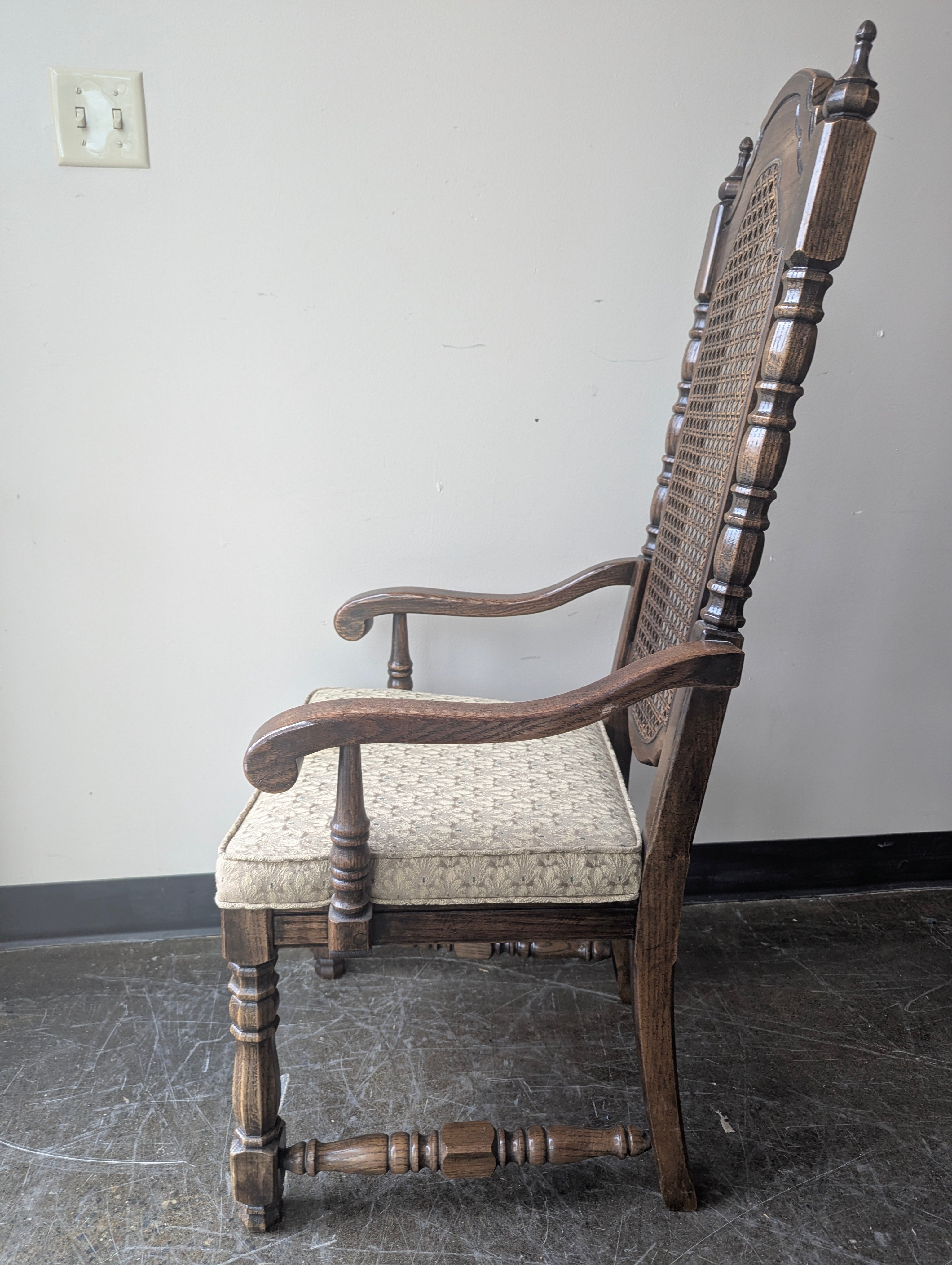 Vintage Dark Wood Armchair with Cane Back and Upholstered Seat