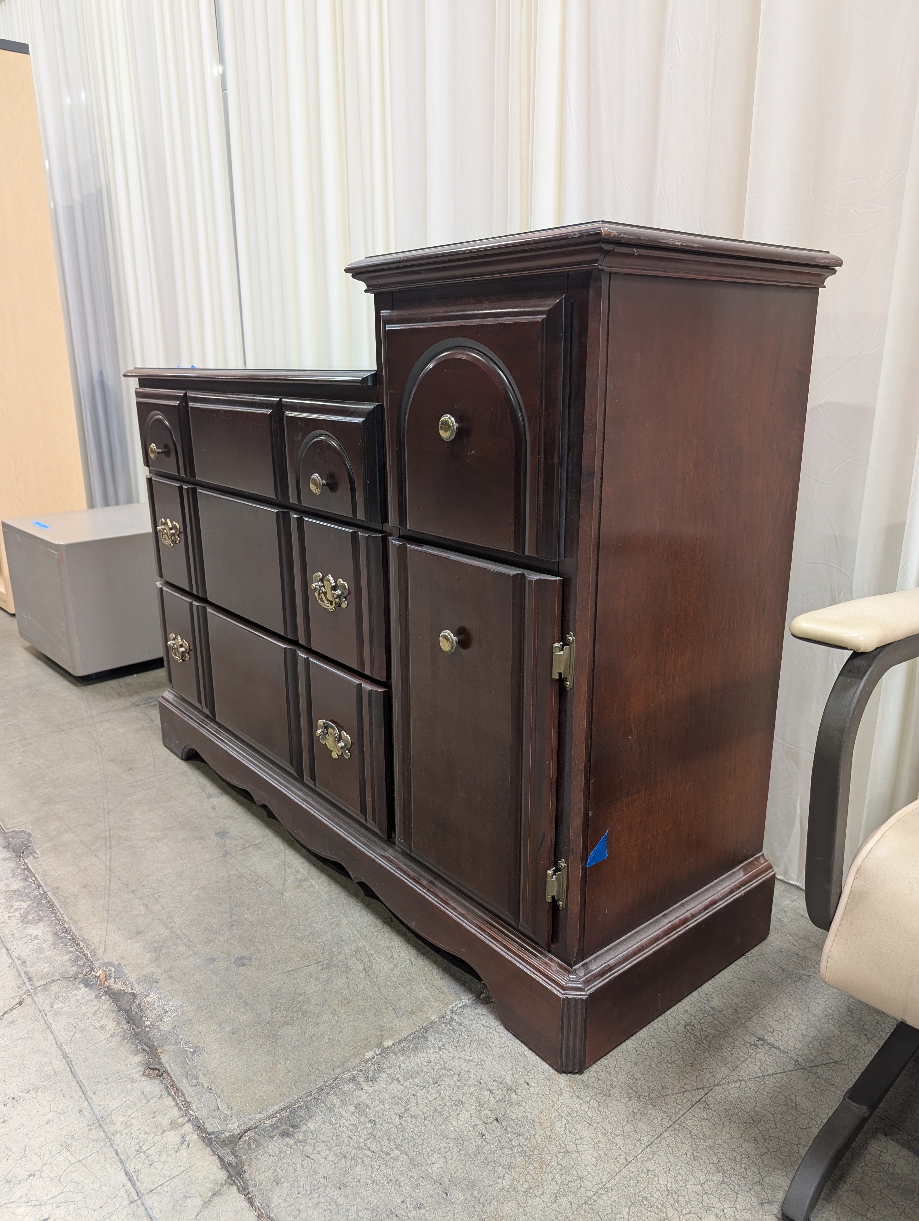 Traditional Dark Wood Dresser with Ornate Hardware