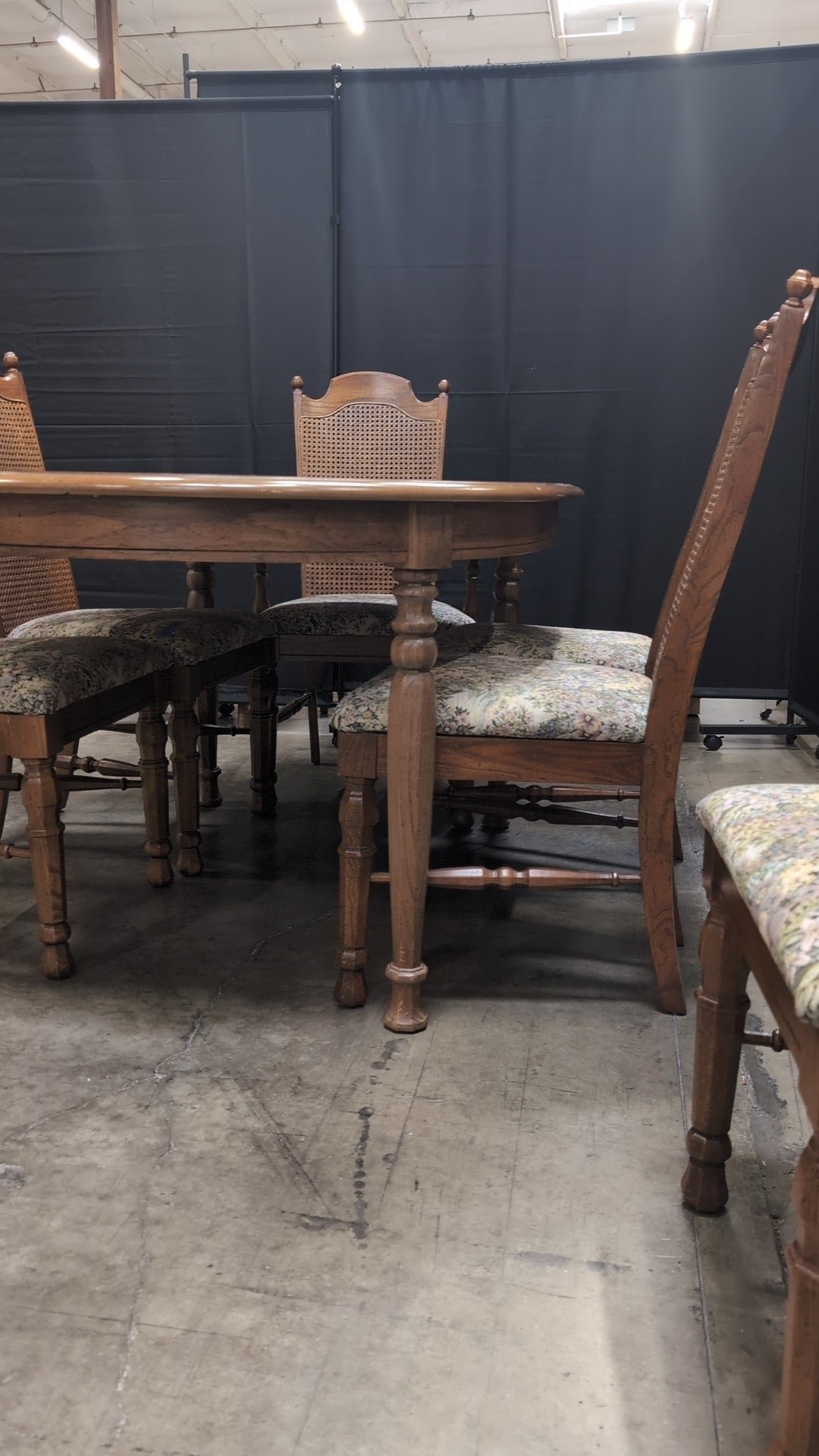 Traditional Oval Wood Dining Table with Six Cane Back Chairs