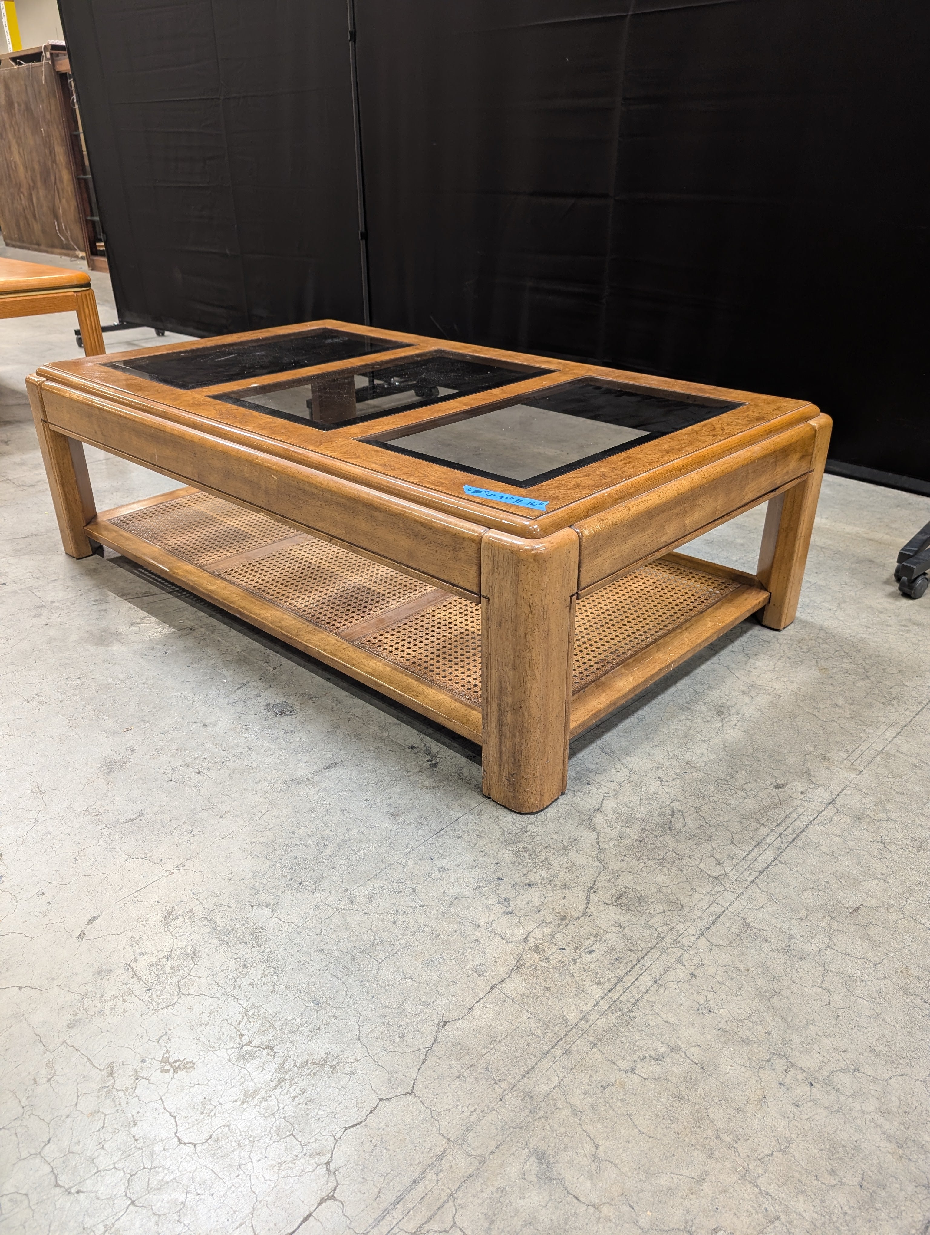 Vintage Style Burled Wood Coffee Table with Glass Top and Cane Accents