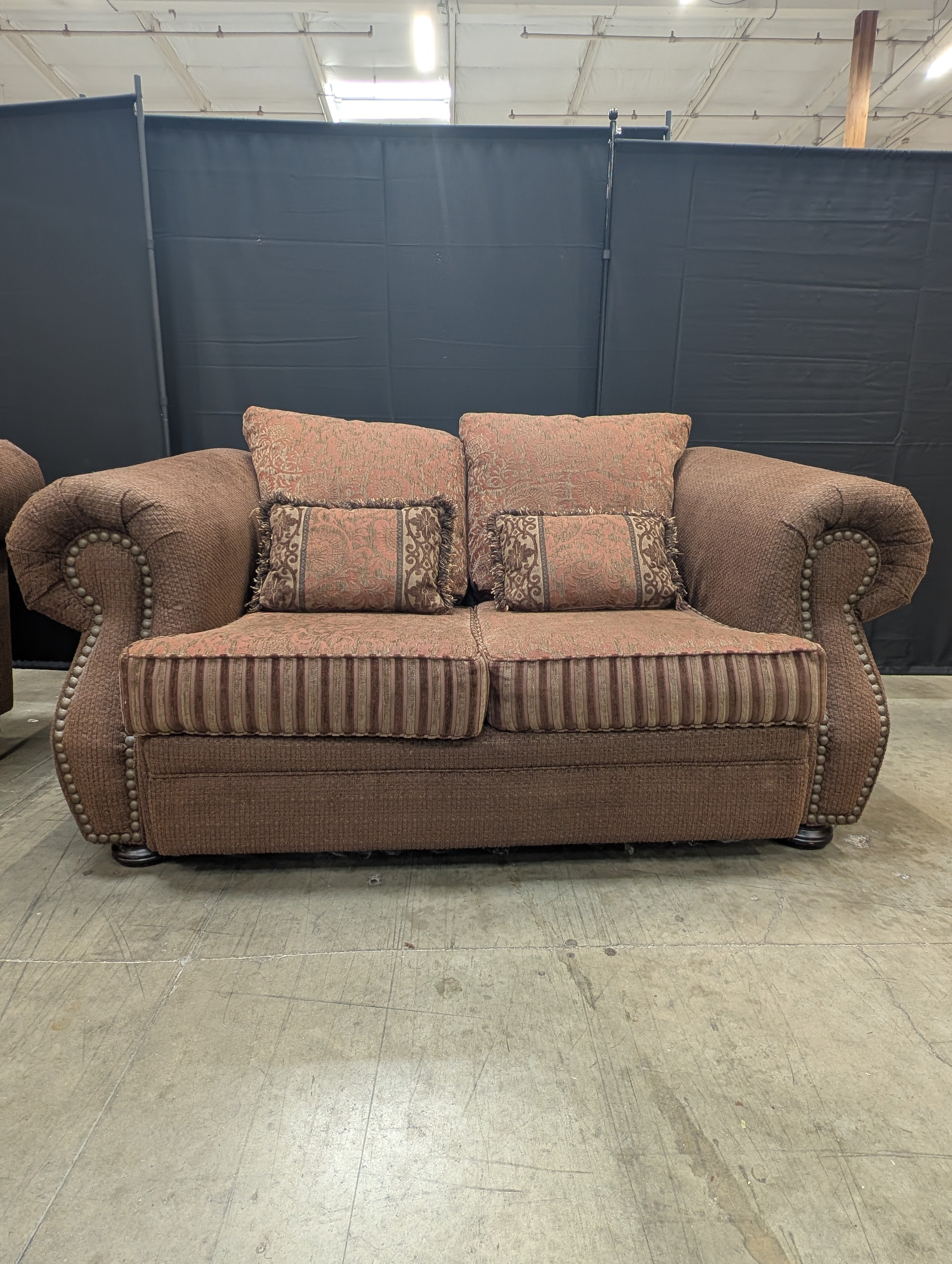 Textured Brown Loveseat with Nail Trim