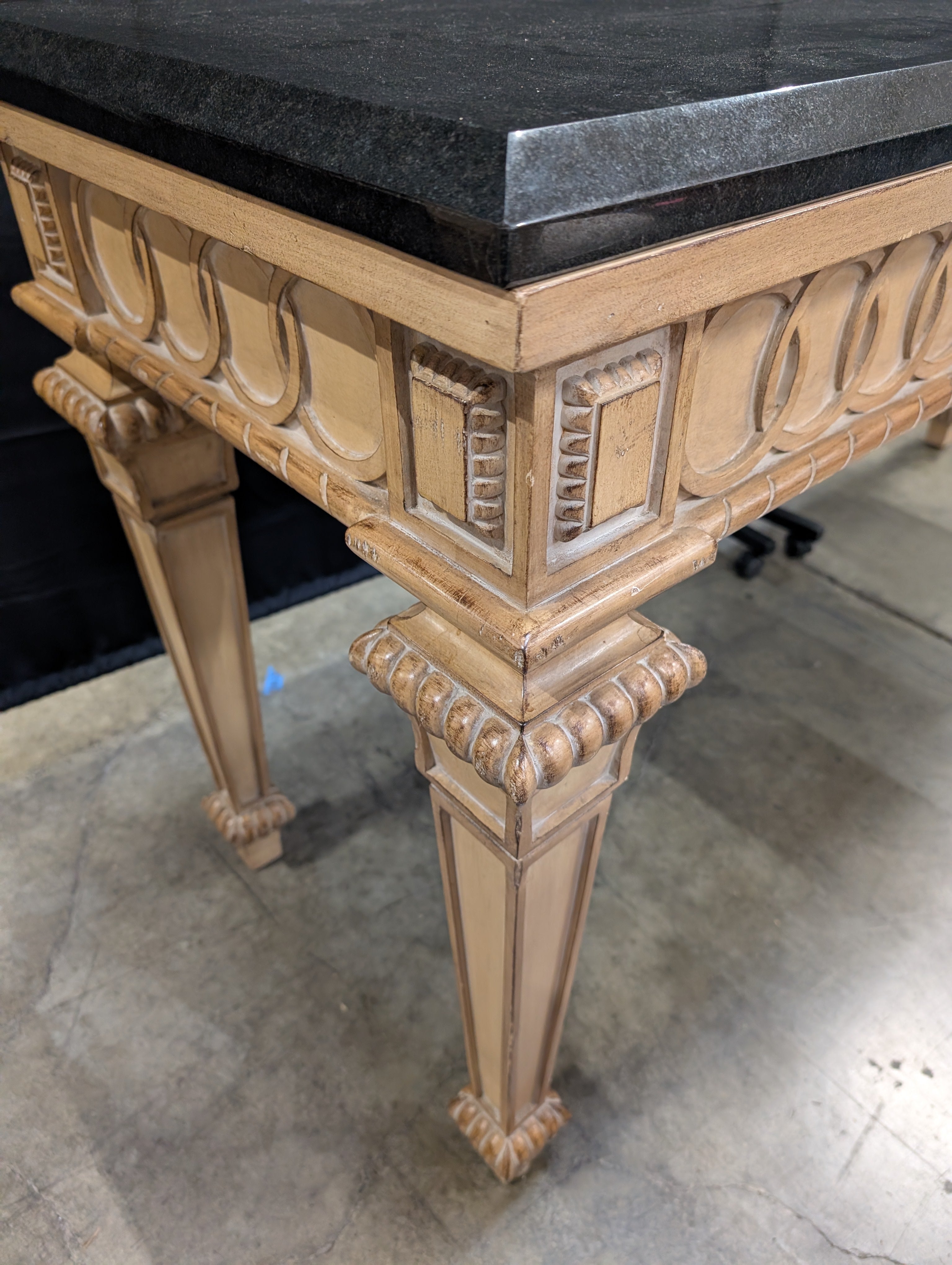 Ornate Carved Wood Console Table with Dark Stone Top