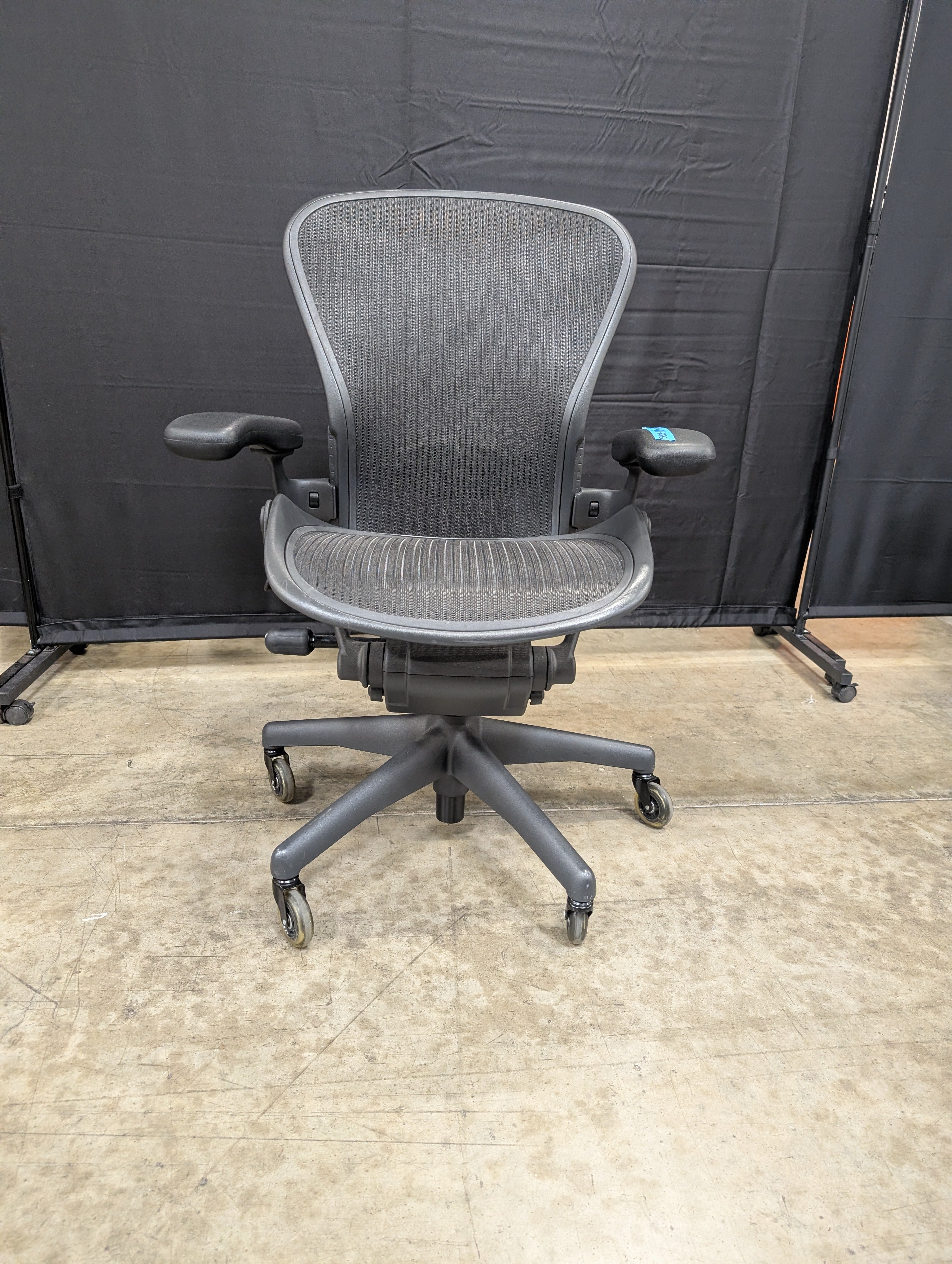 Black Mesh High-Back Herman Miller Office Chair with Headrest