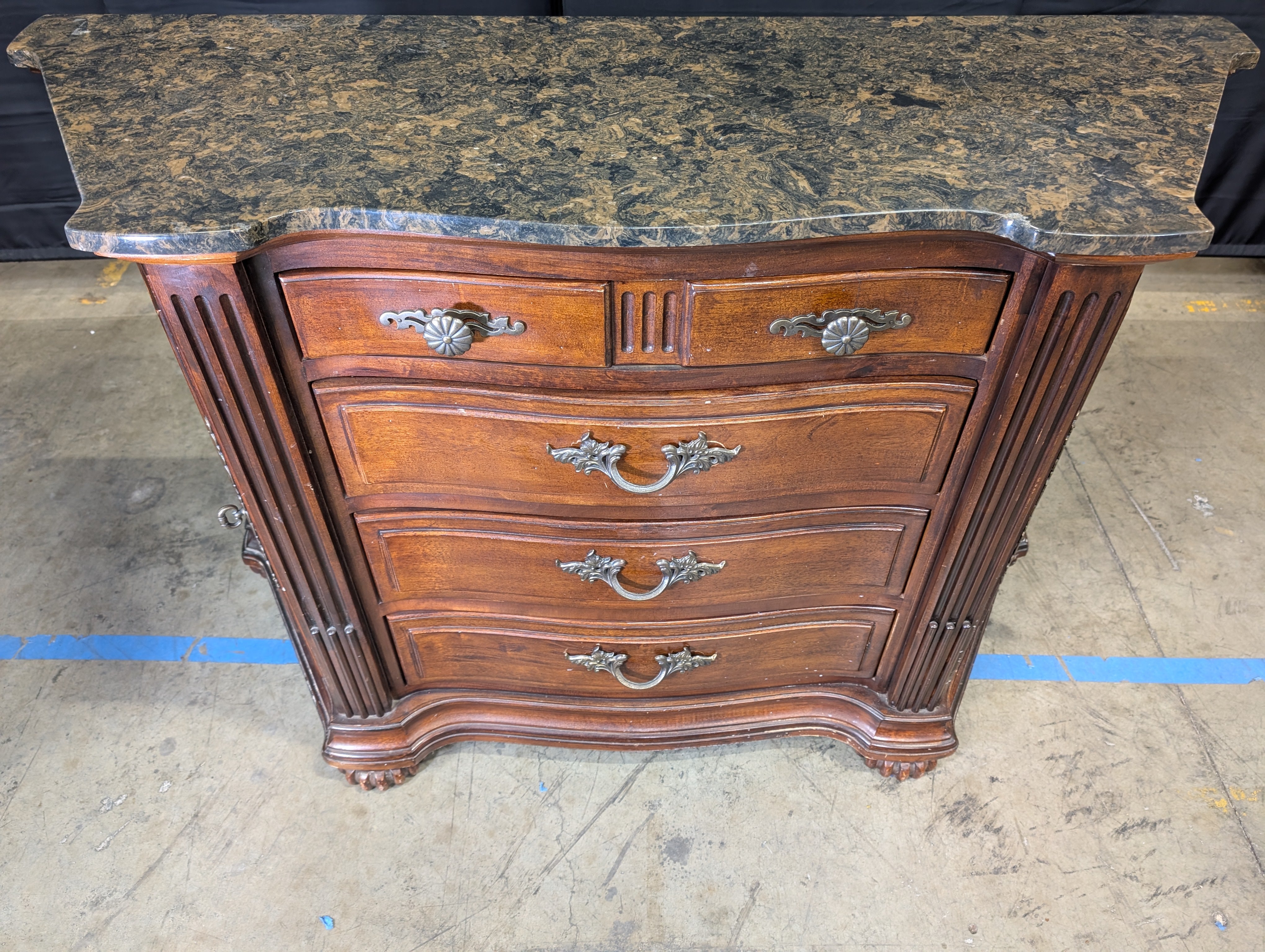 Traditional Cherry Stained Wood Dresser with Ornate Hardware