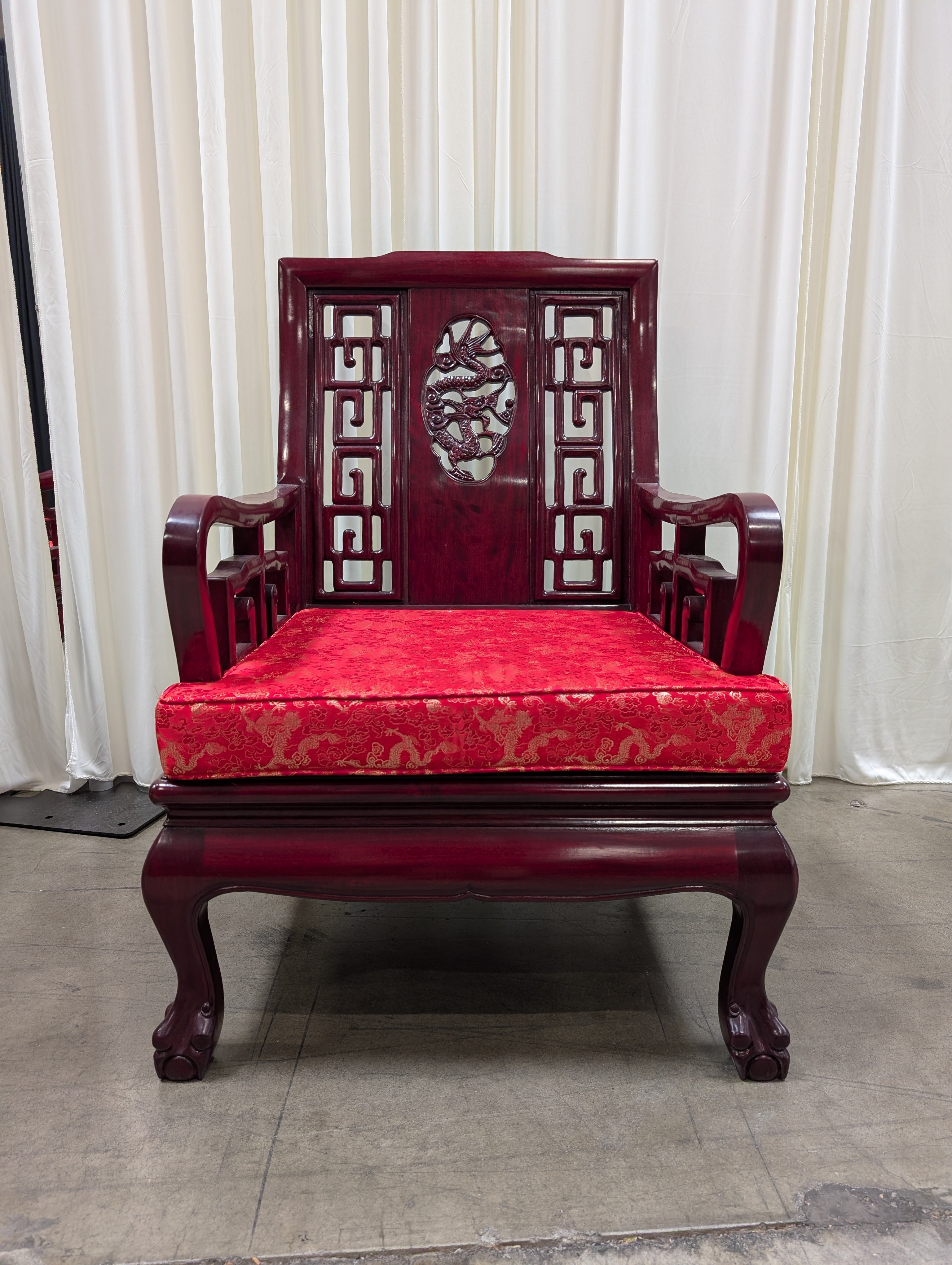Dark Wood Carved Arm Chair with Red Cushion
