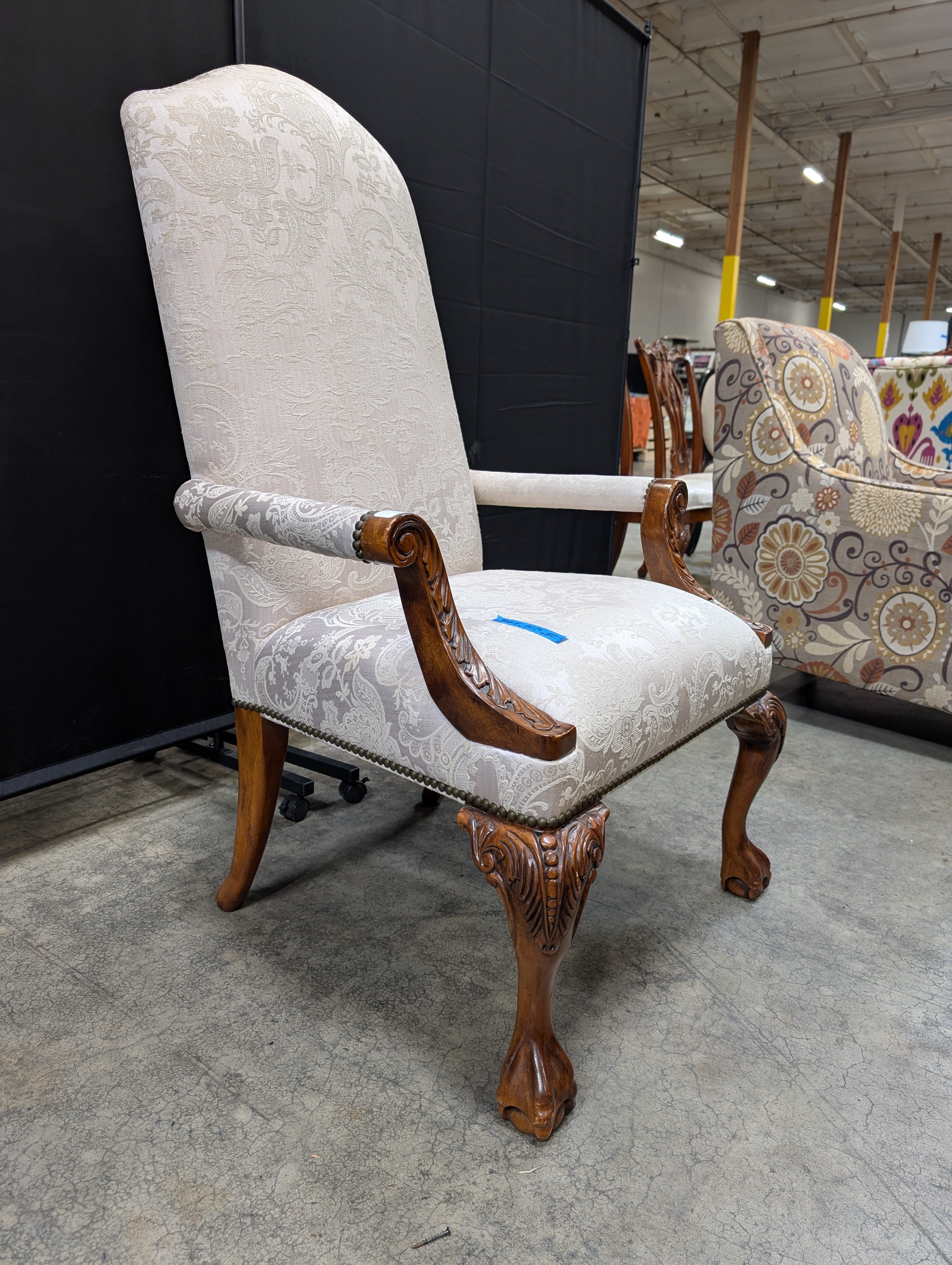 Ornate Carved Wood High-Back Armchair with Damask Upholstery
