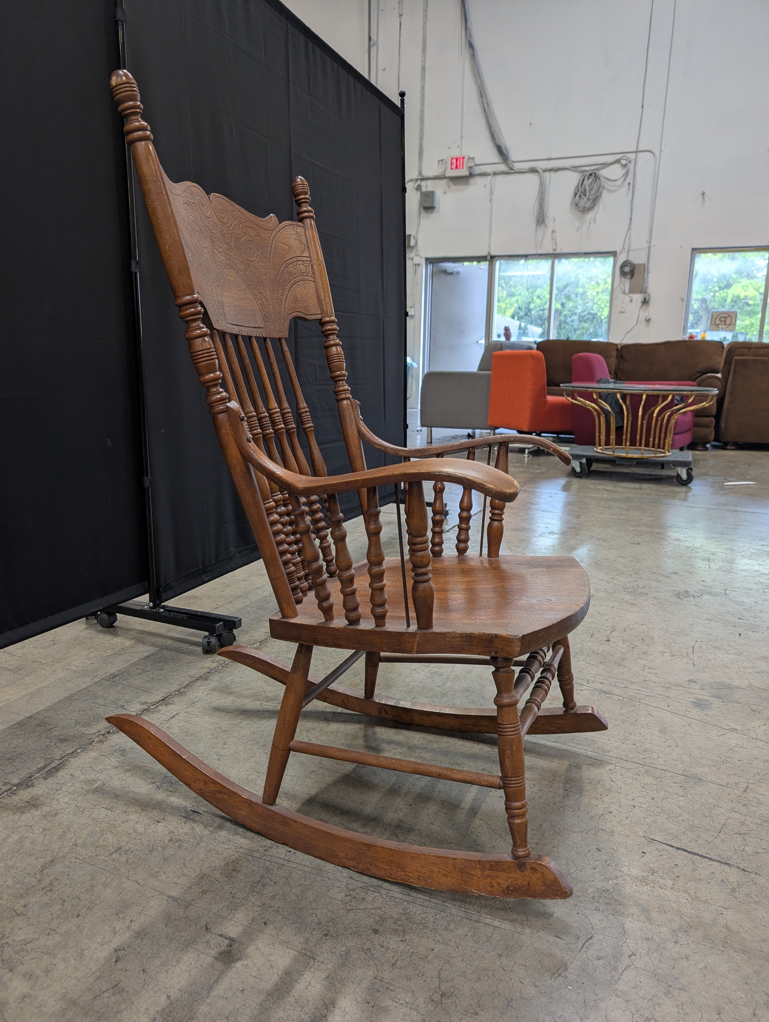 Classic Hardwood Rocking Chair with Ornate Carved Backrest