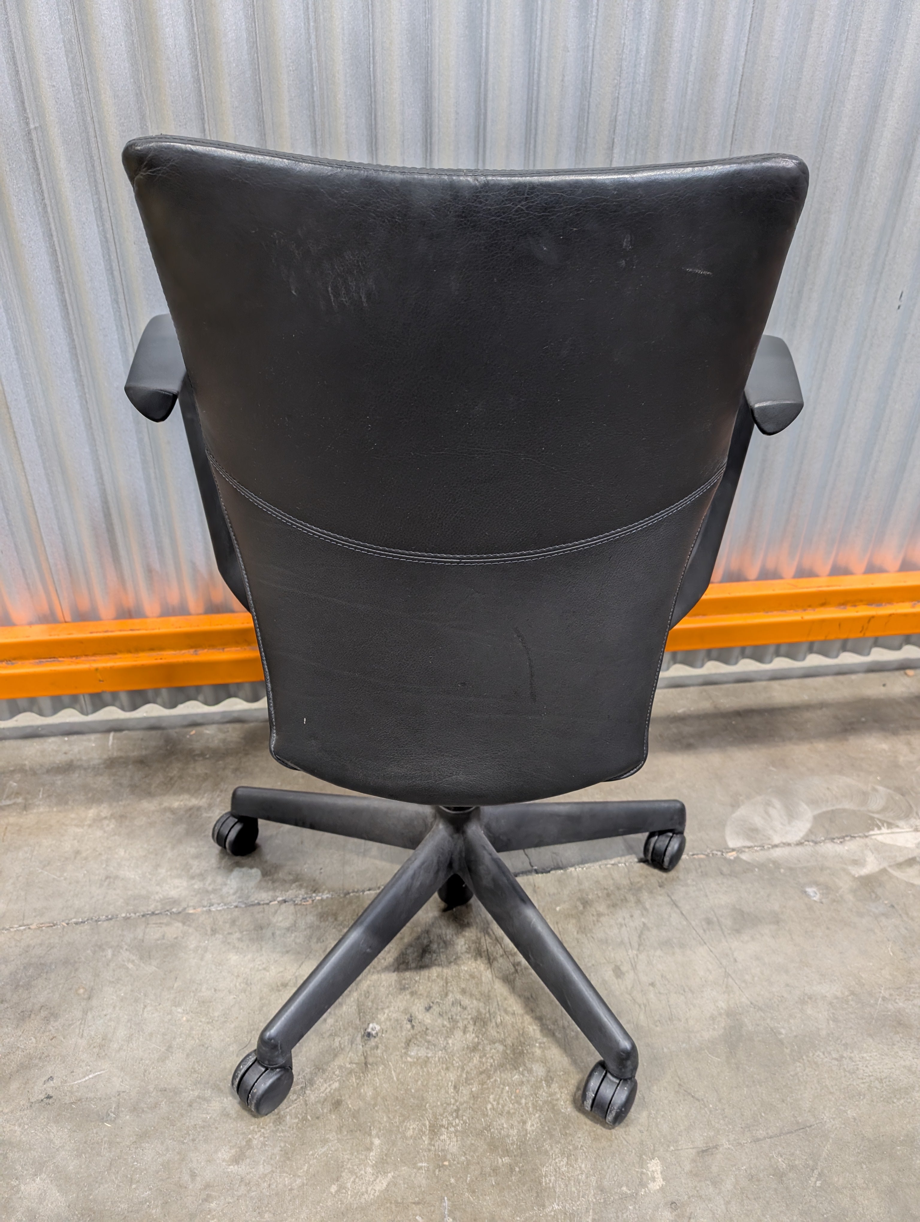 Sleek Black Leather Office Chair with Arms