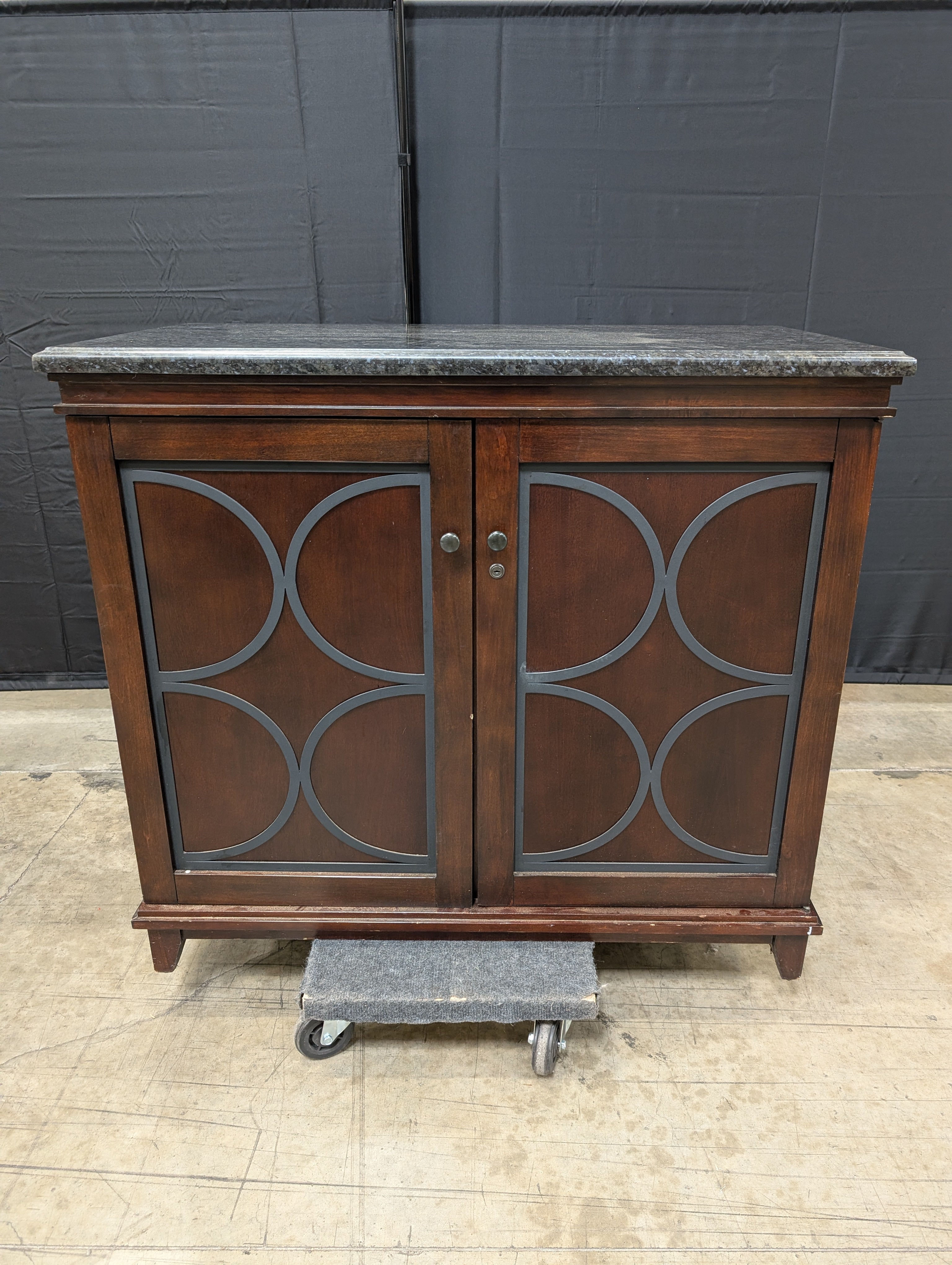 Dark Wood Wine Storage Cabinet with Granite Top and Decorative Doors