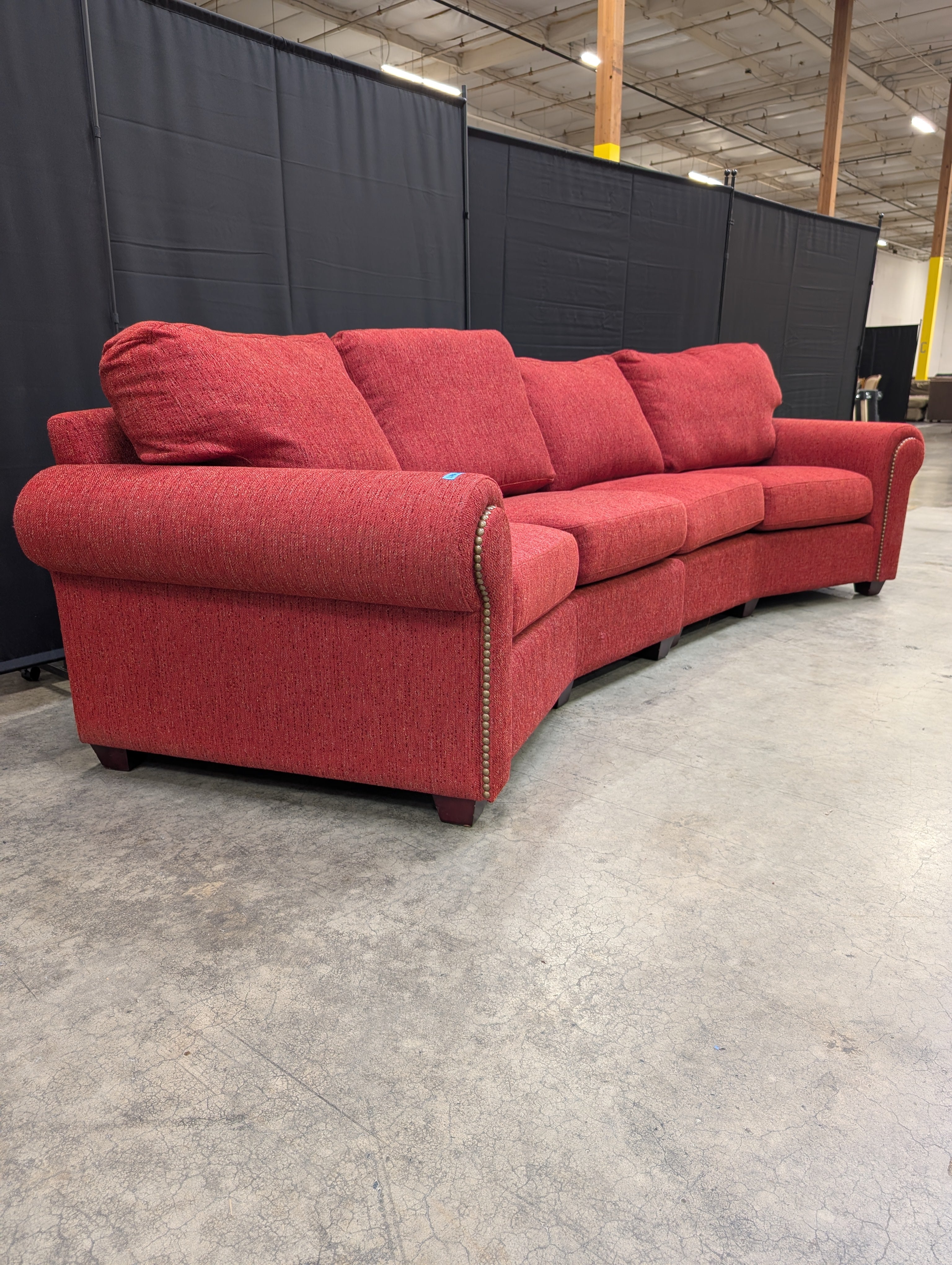 Curved Red Textured Fabric Couch with Nailhead Trim