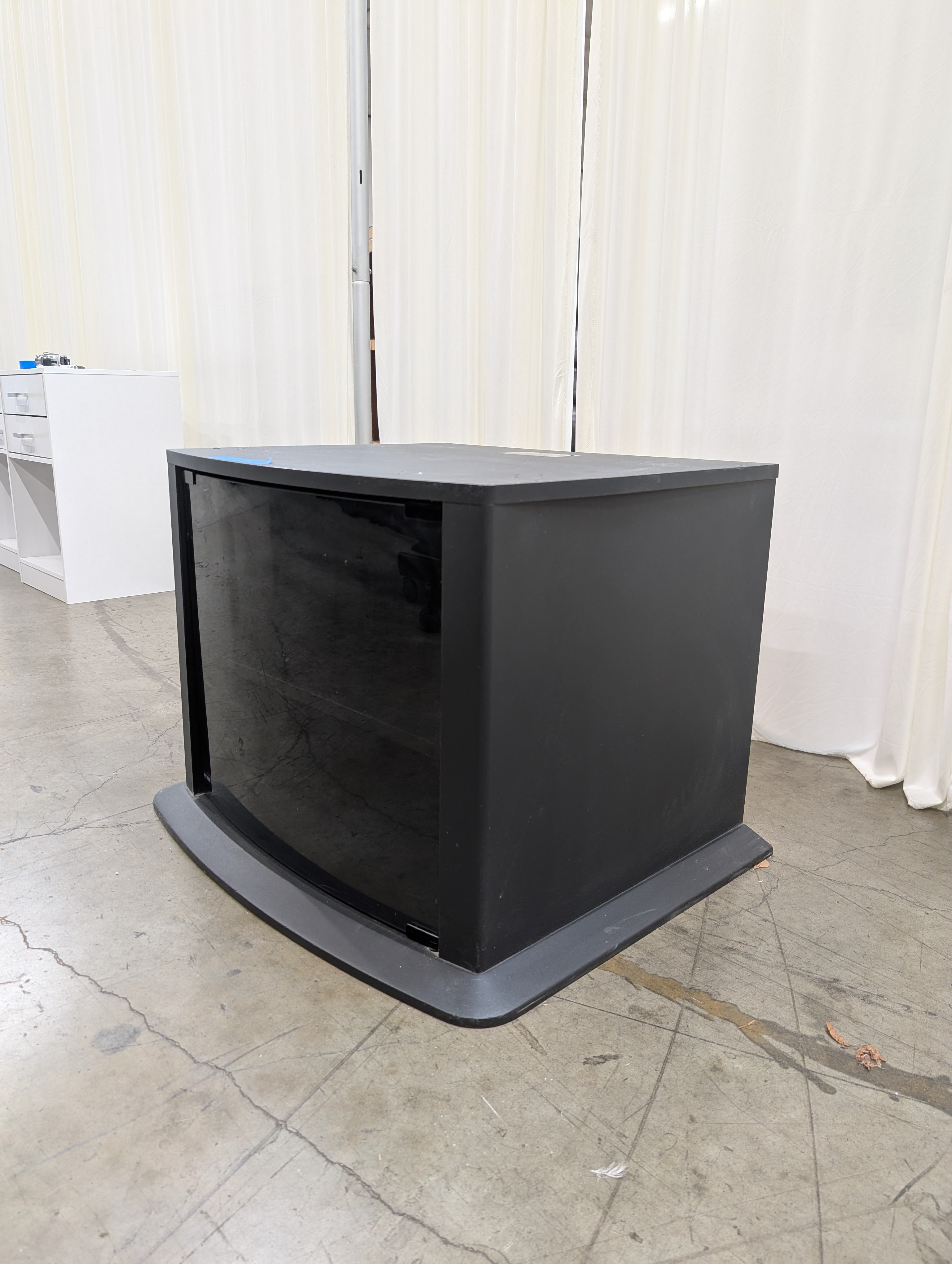 Curved Black Glass TV Stand with Tinted Door