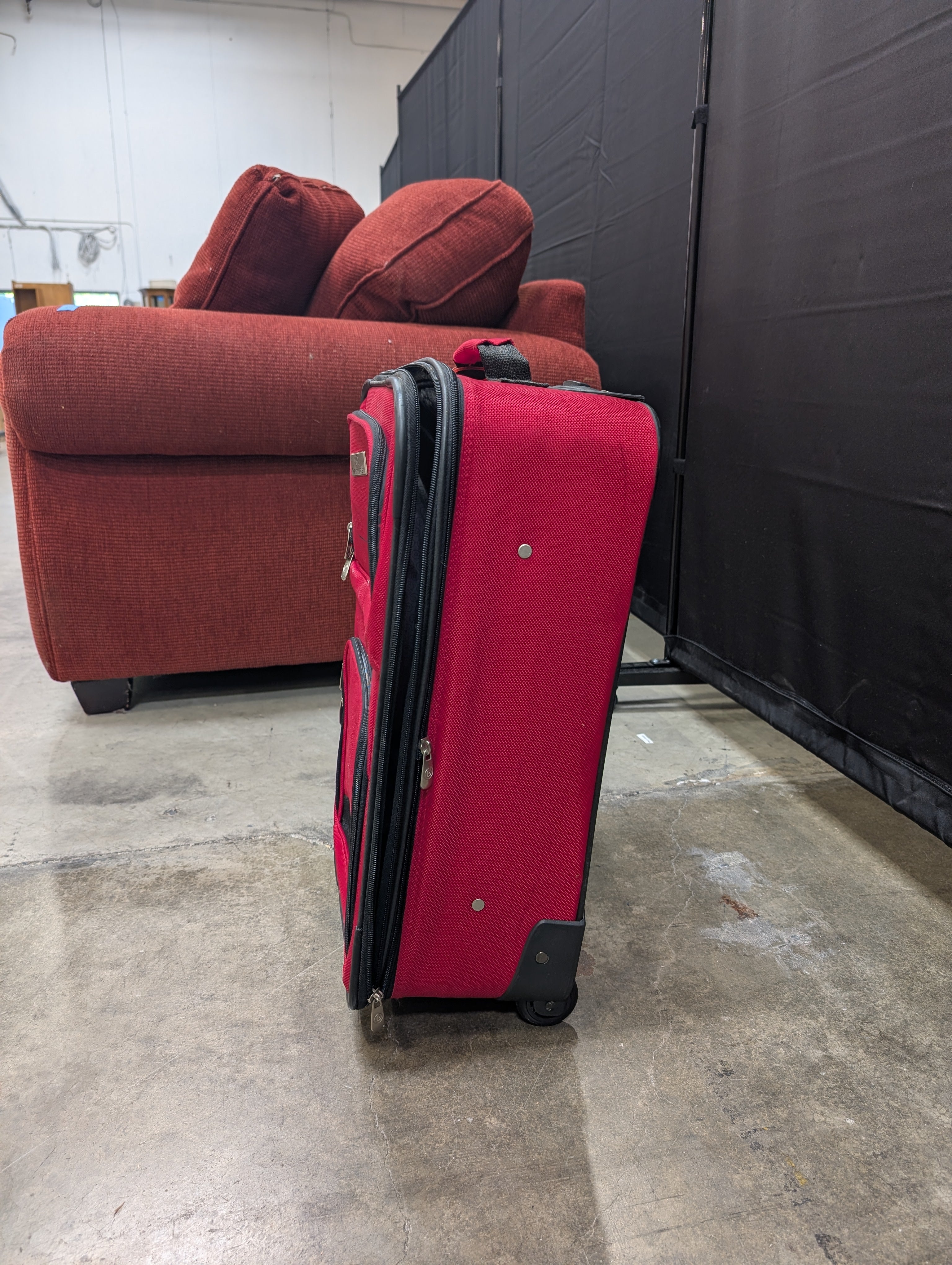 Red Softshell Rolling Suitcase with Exterior Pockets
