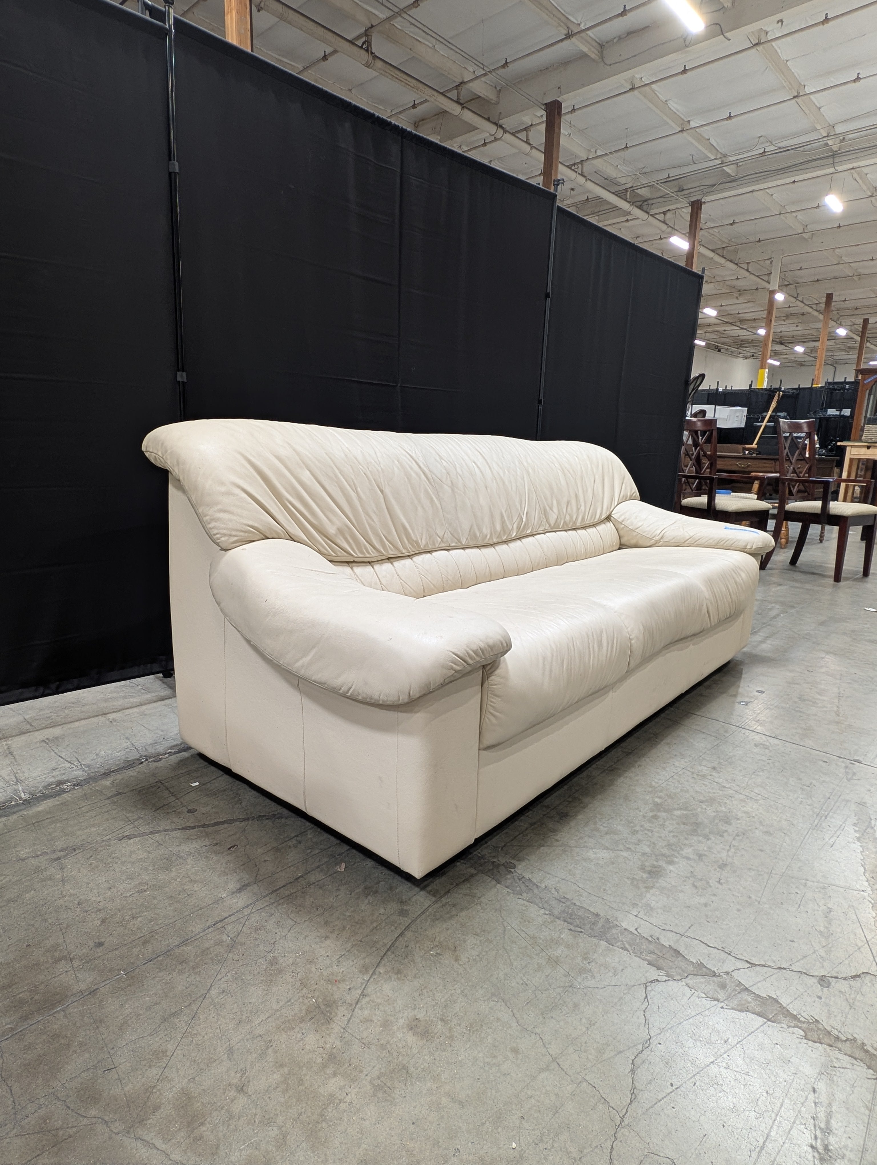 Cream Natuzzi Three-Seater Upholstered Sofa