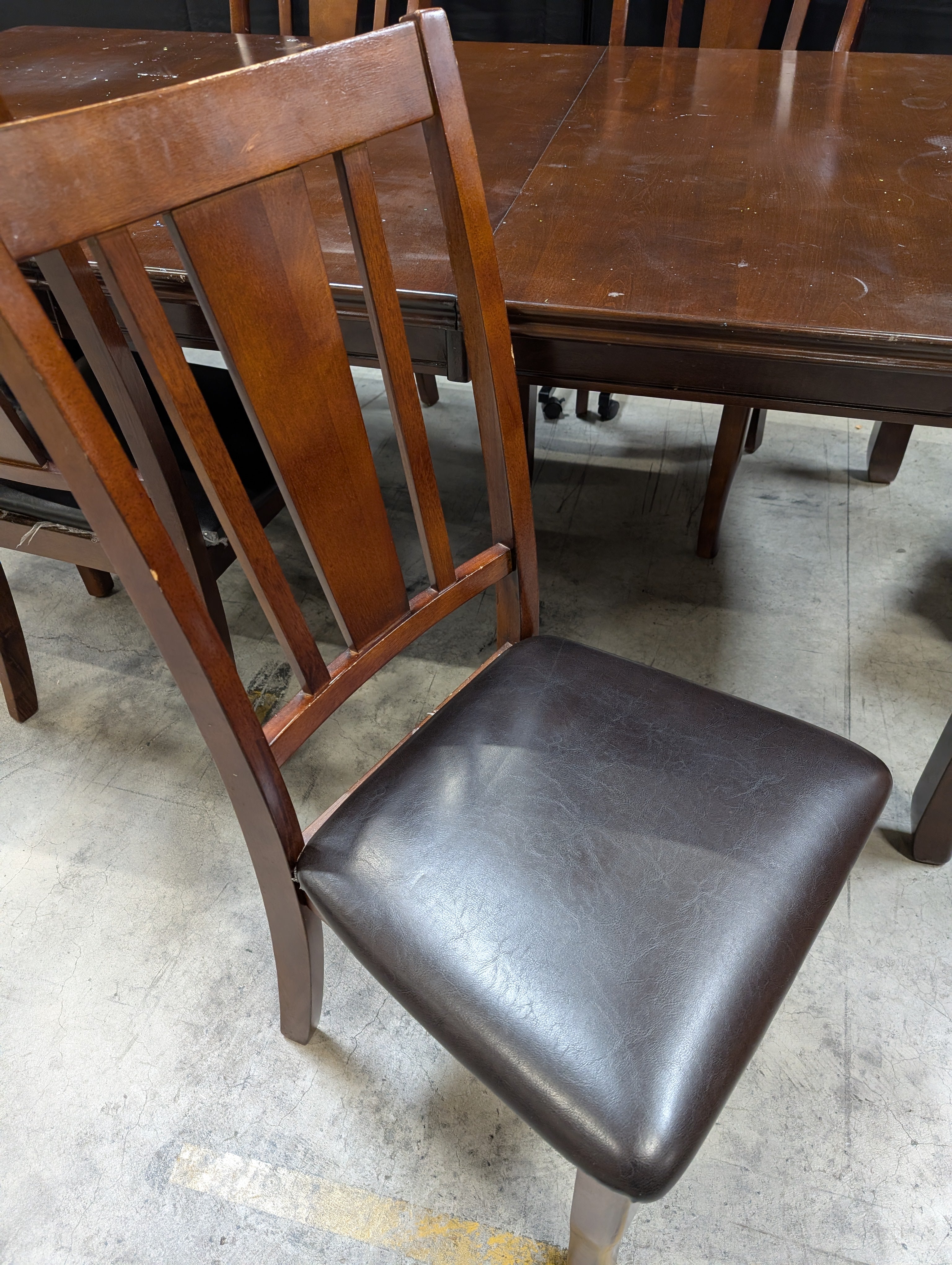 Used Dark Brown Wood Dining Table with Six Slat Back Chairs