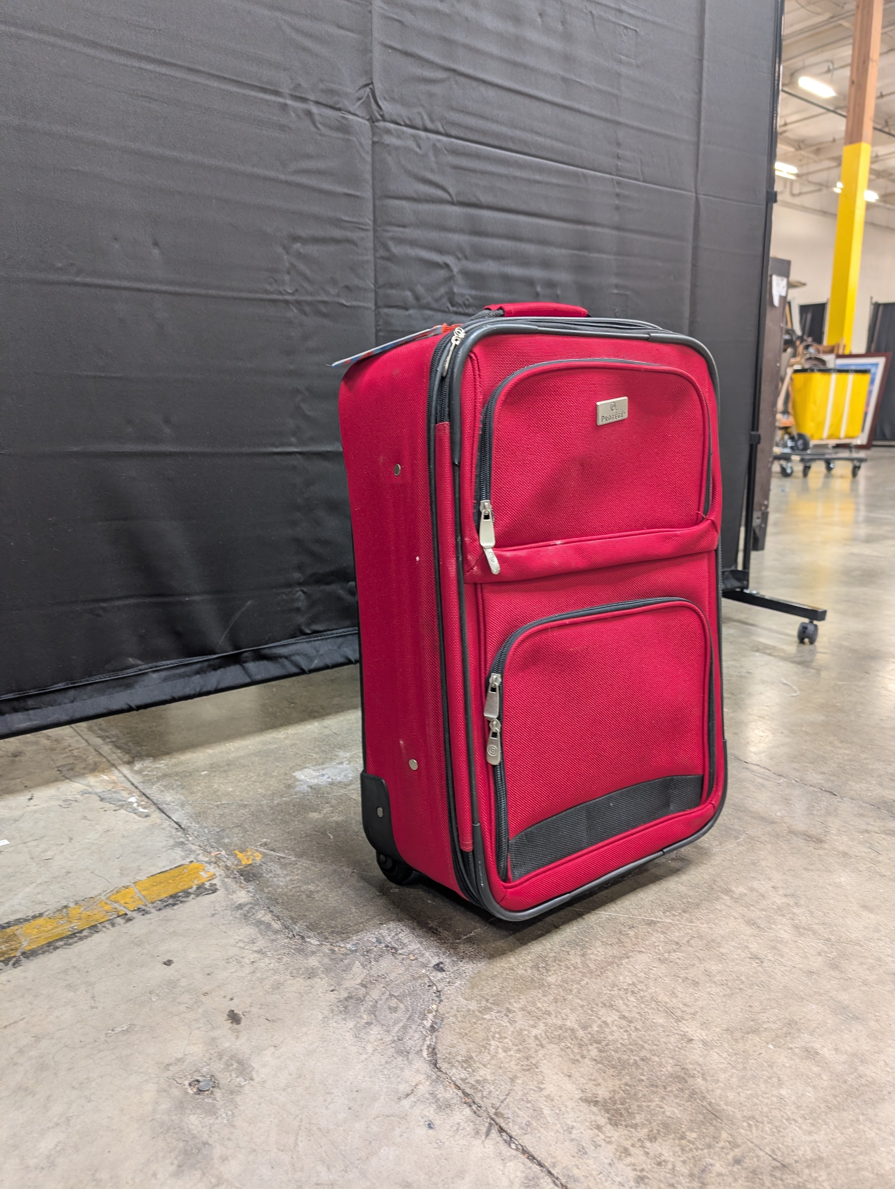 Red Softshell Rolling Suitcase with Exterior Pockets