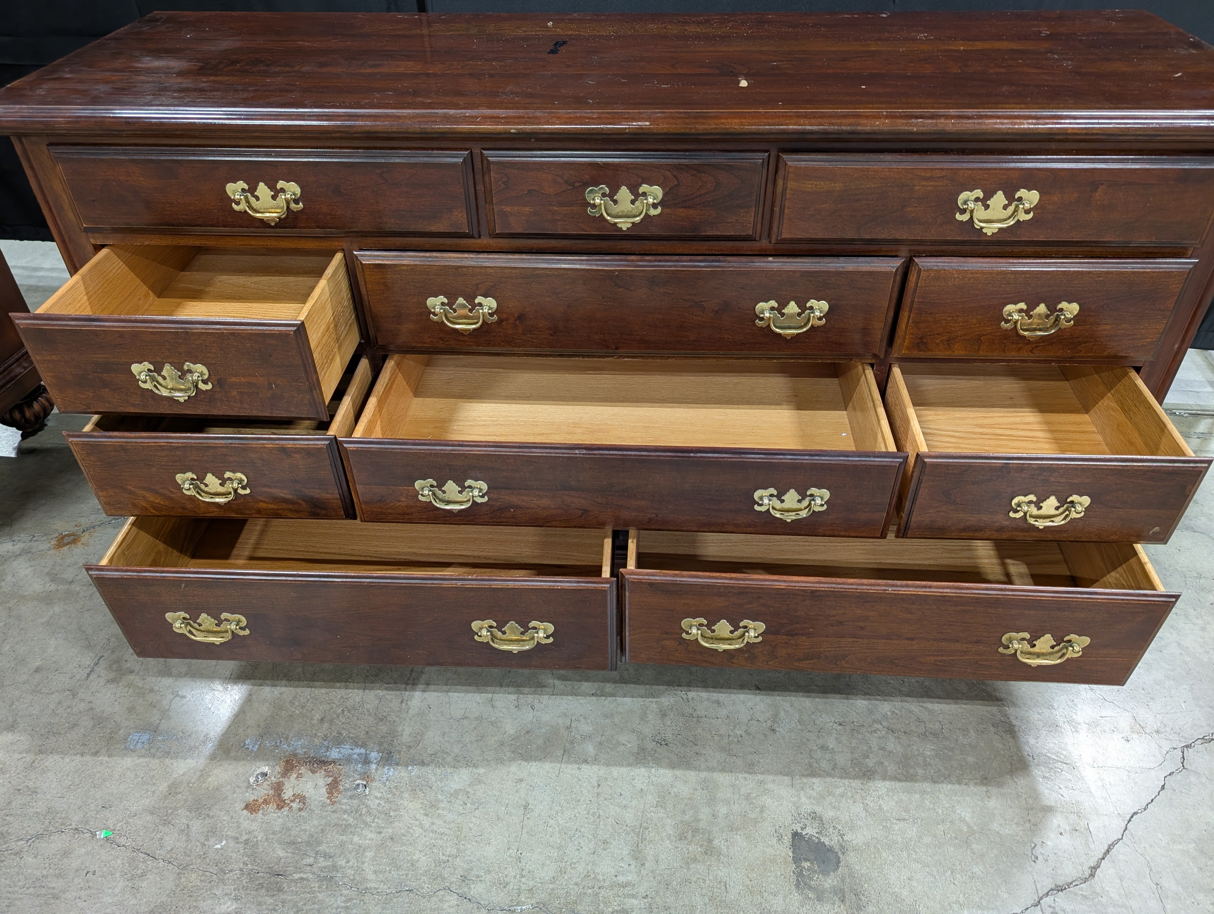 Traditional Dark Wood Dresser with Brass Bail Pulls