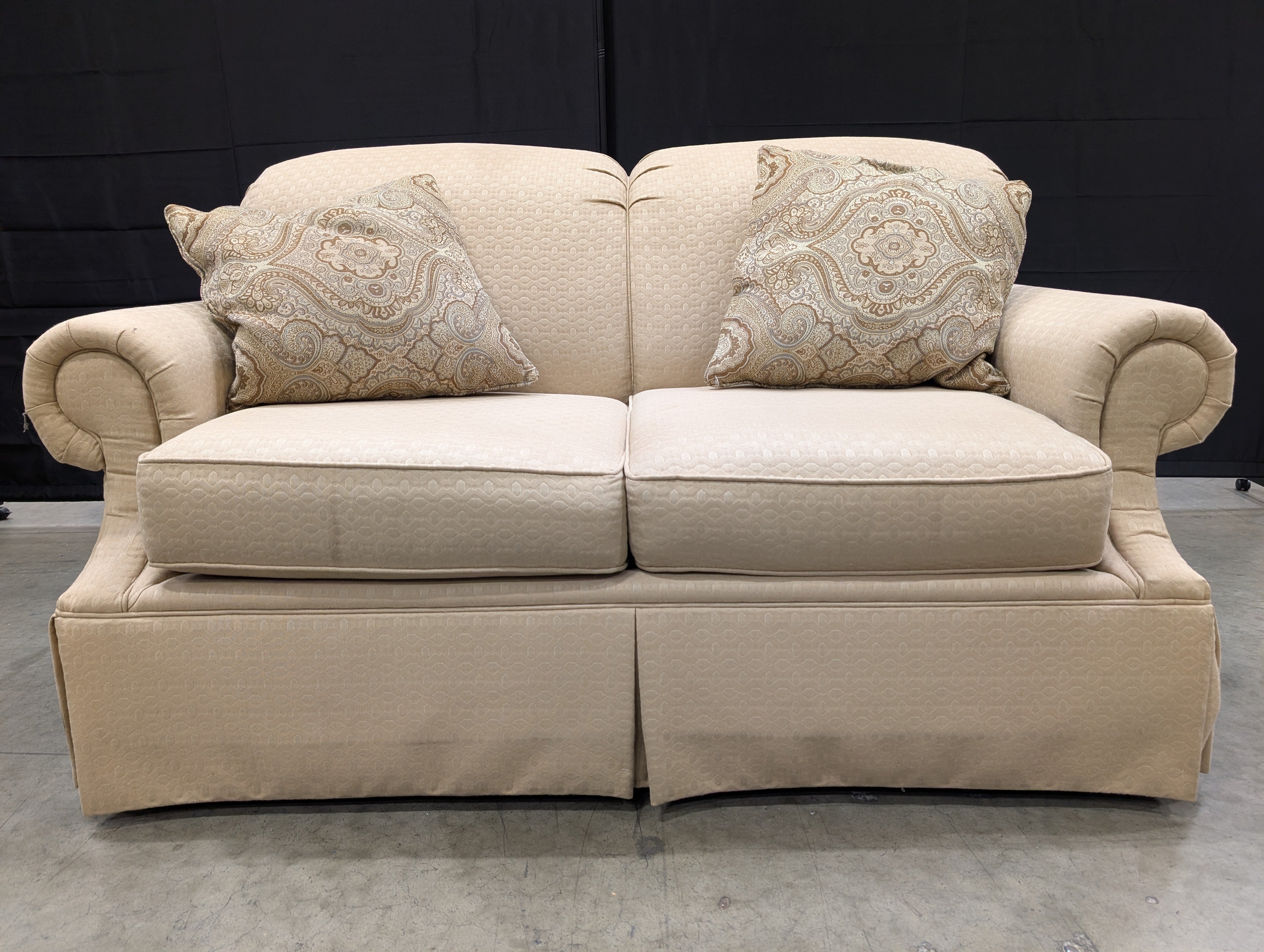 Classic Tan Two-Seater Sofa with Rolled Arms