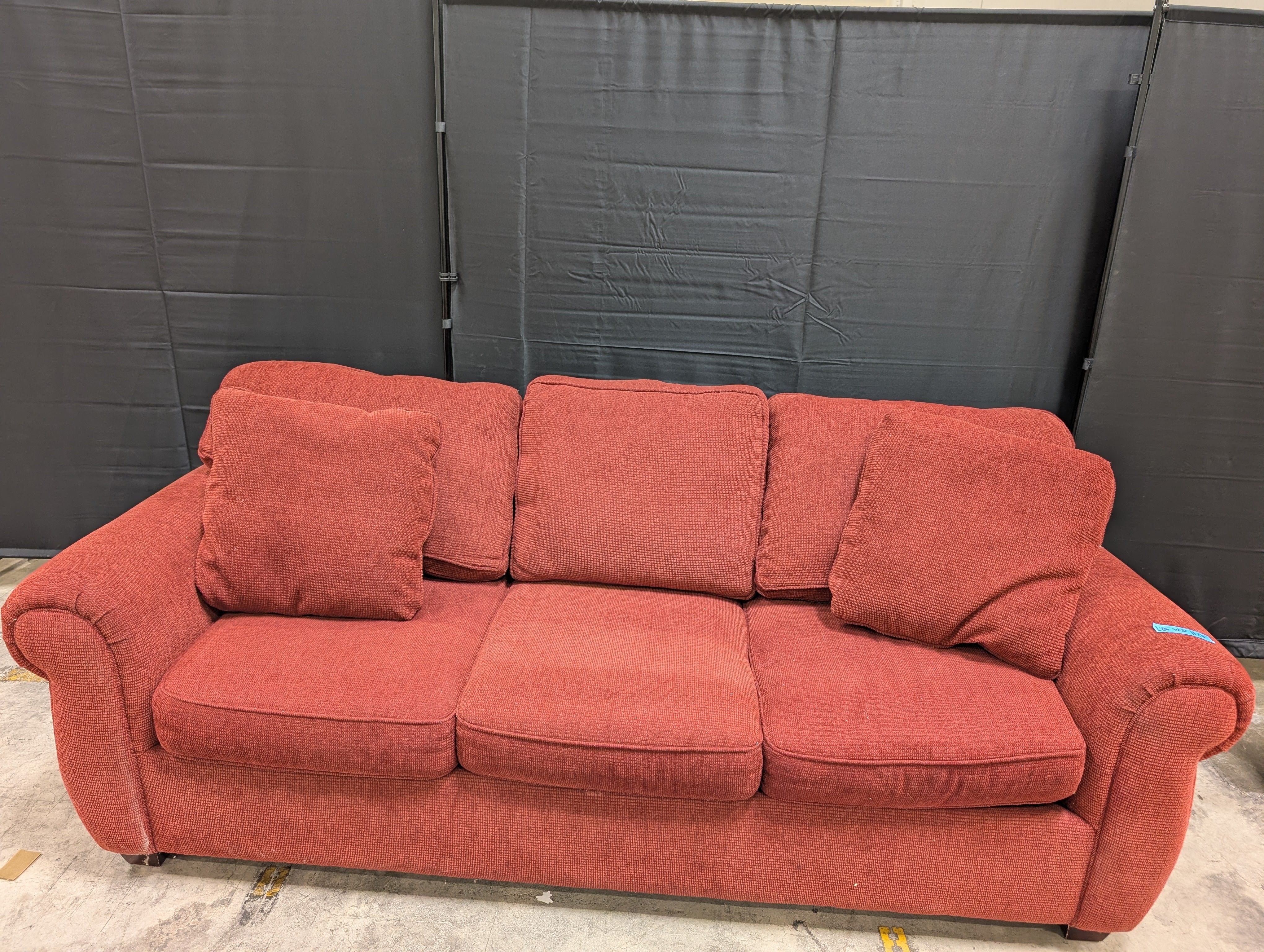Red Textured Fabric Couch with Rolled Arms