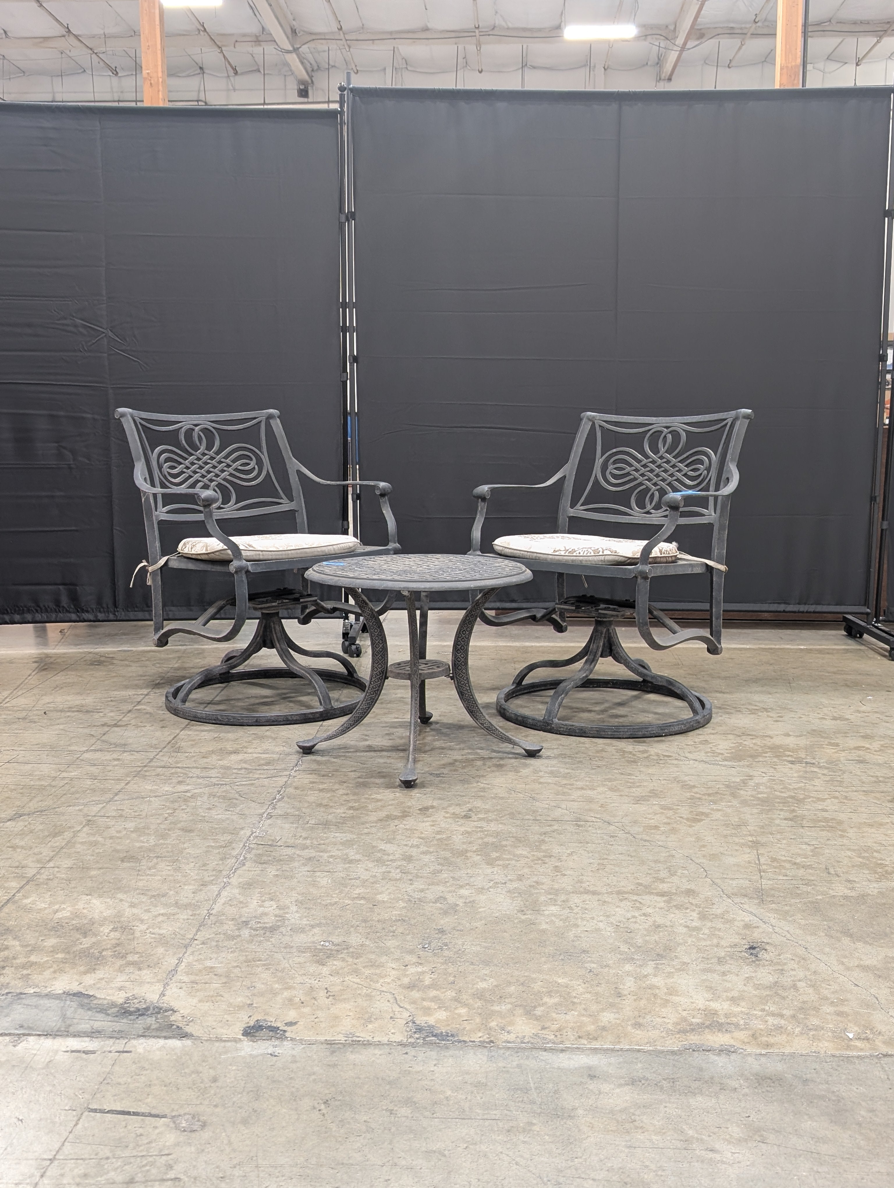 Ornate Cast Metal Outdoor Bistro Set with Swivel Chairs