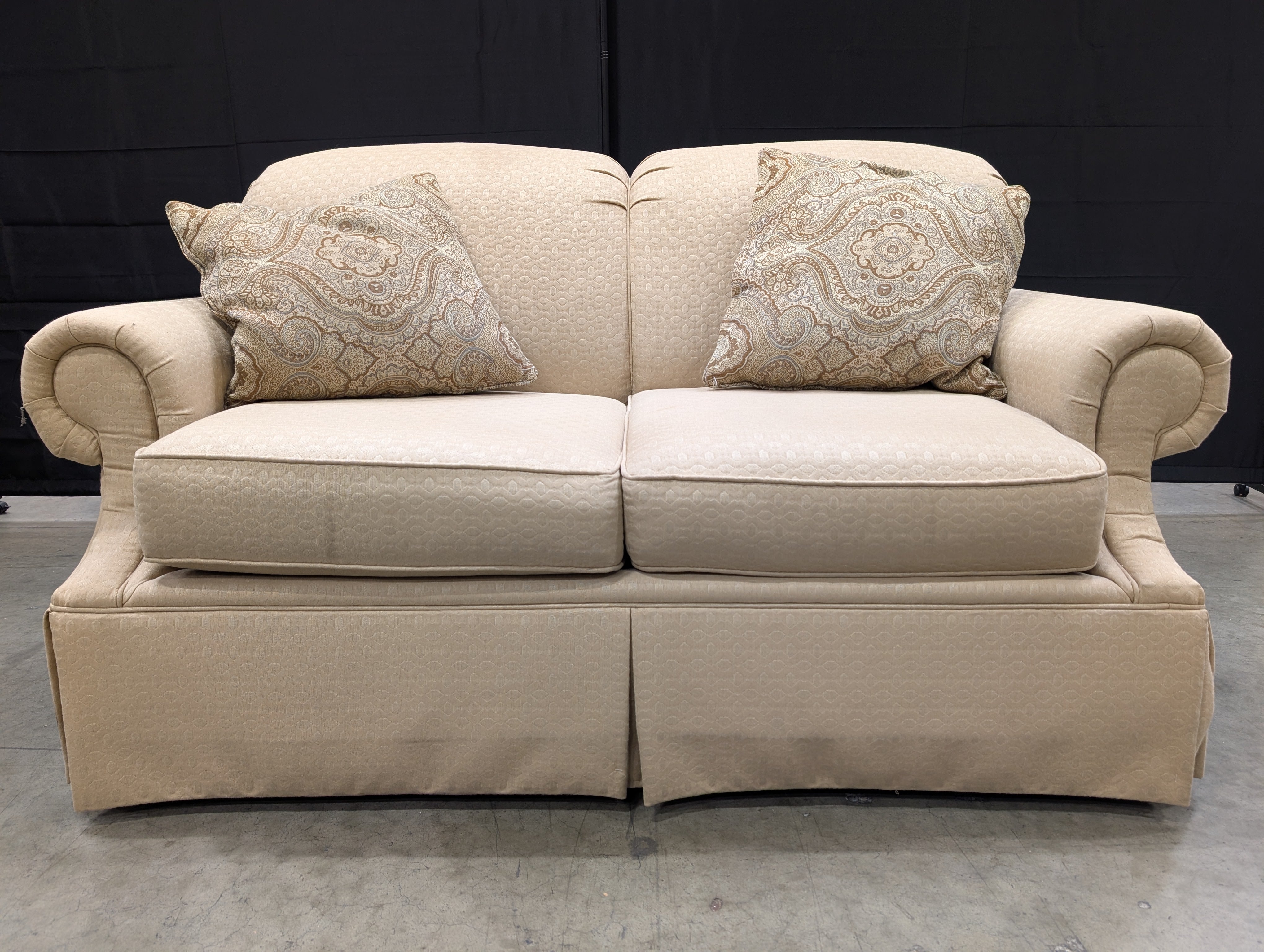 Classic Tan Two-Seater Sofa with Rolled Arms