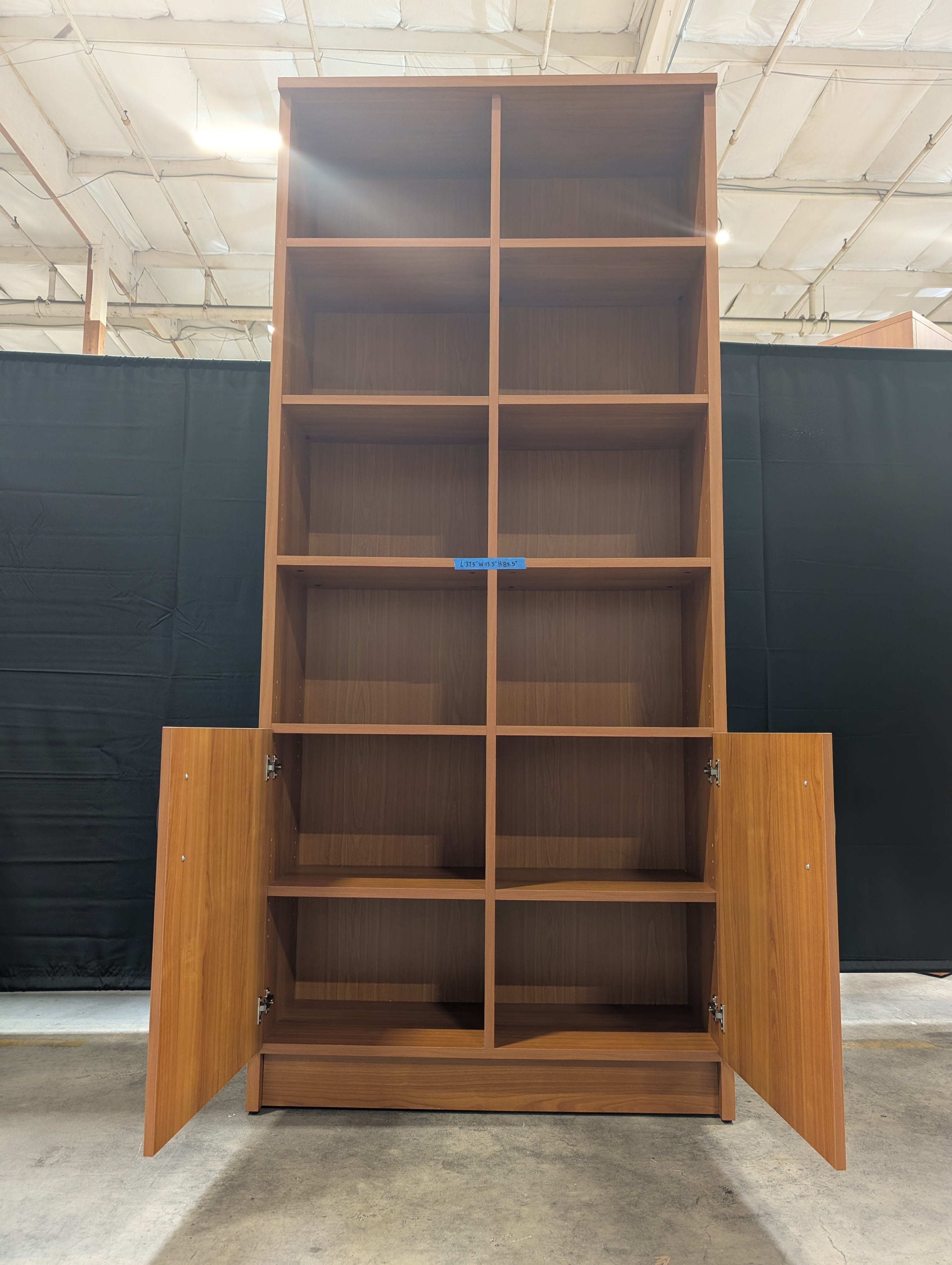 Cherry Wood Tone Multi-Section Bookcase with Lower Cabinet