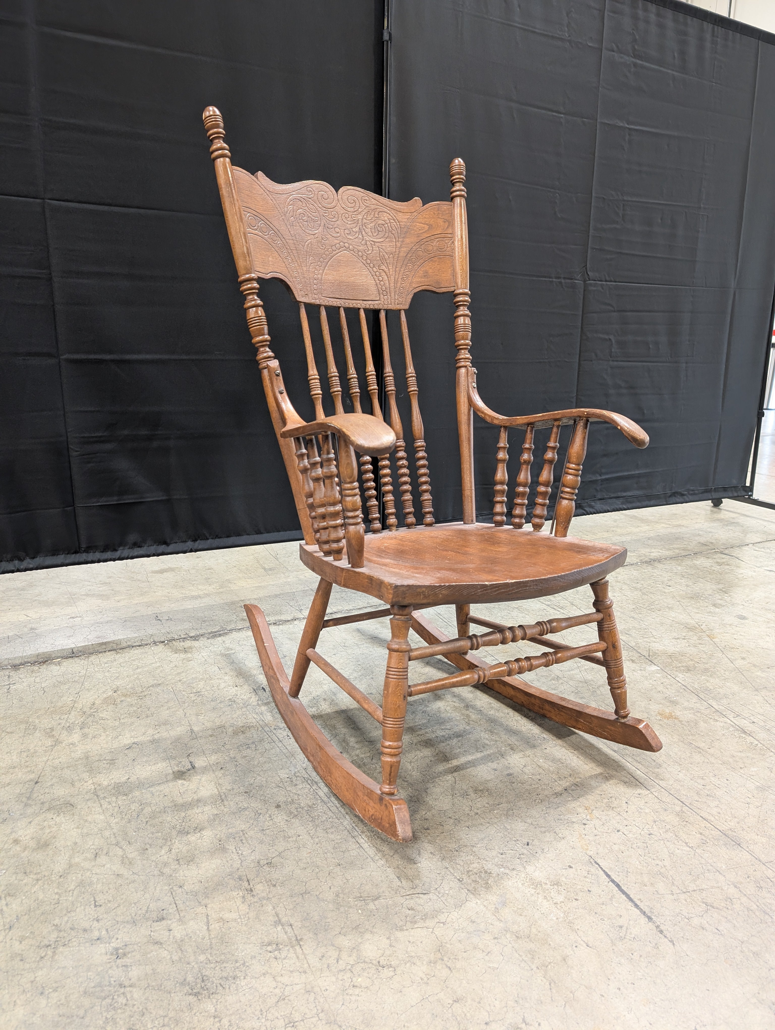 Classic Hardwood Rocking Chair with Ornate Carved Backrest