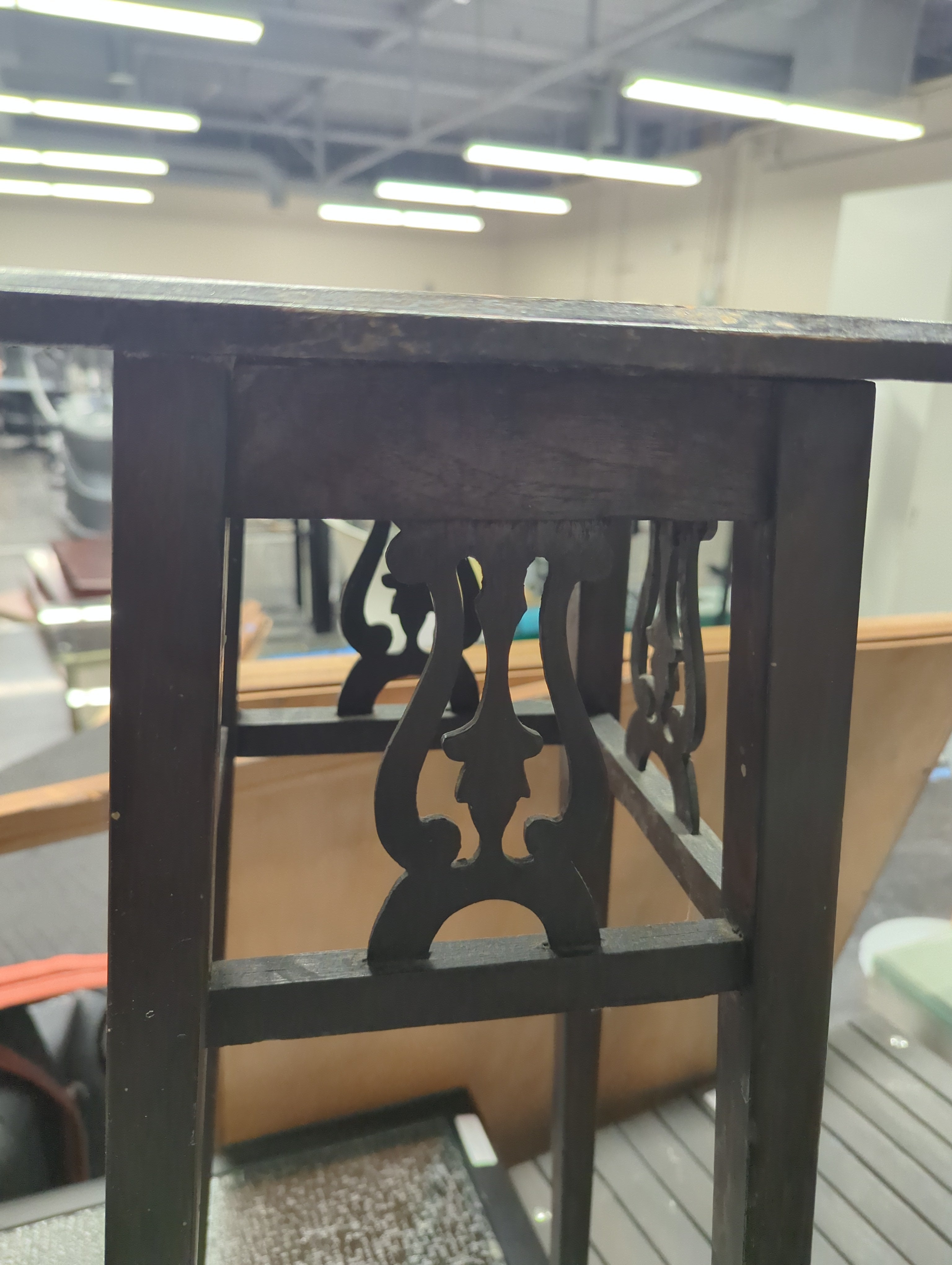 Dark Wood End Table with Intricate Carving