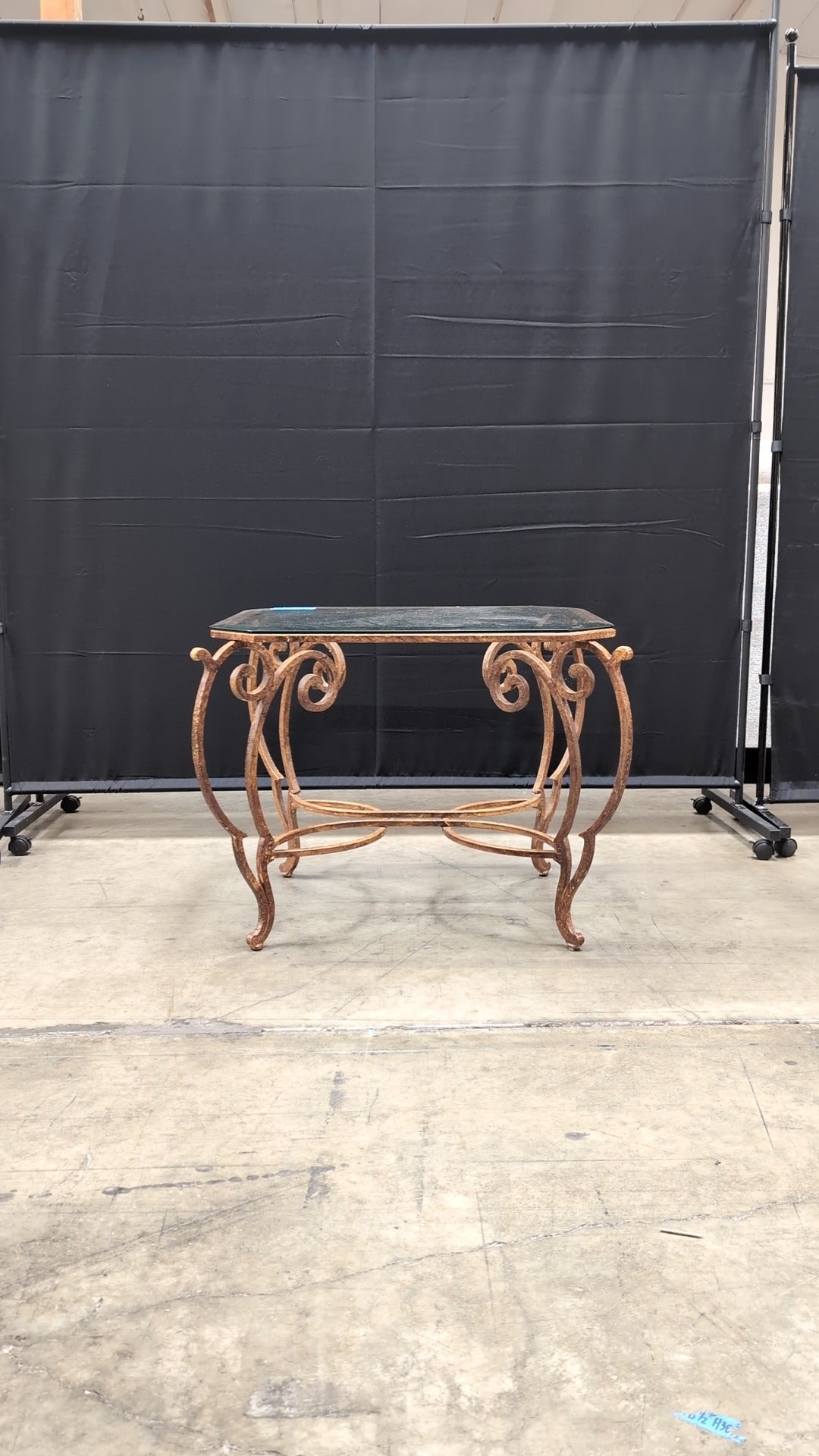 Octagonal Glass Top Accent Table with Scrollwork Metal Base