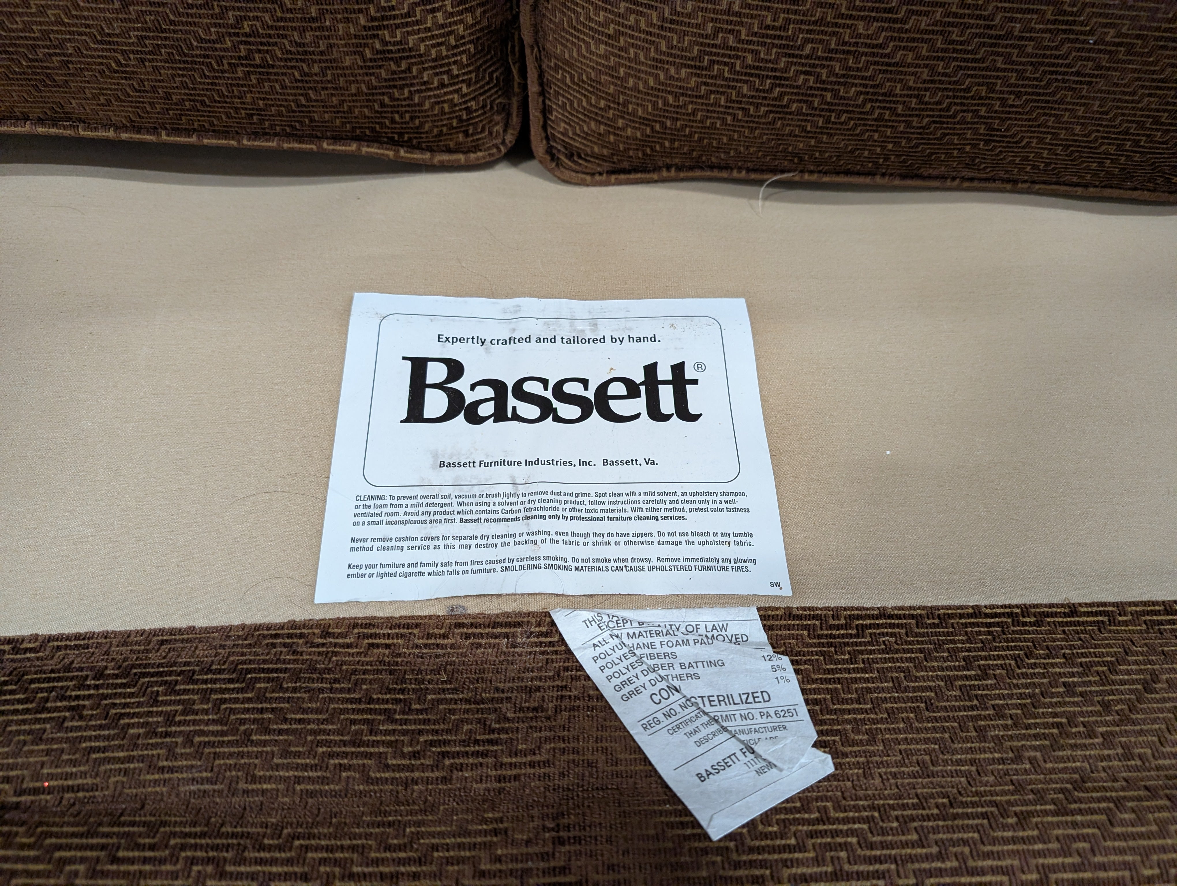 BASSETT Brown Textured Upholstered Loveseat with Rolled Arms