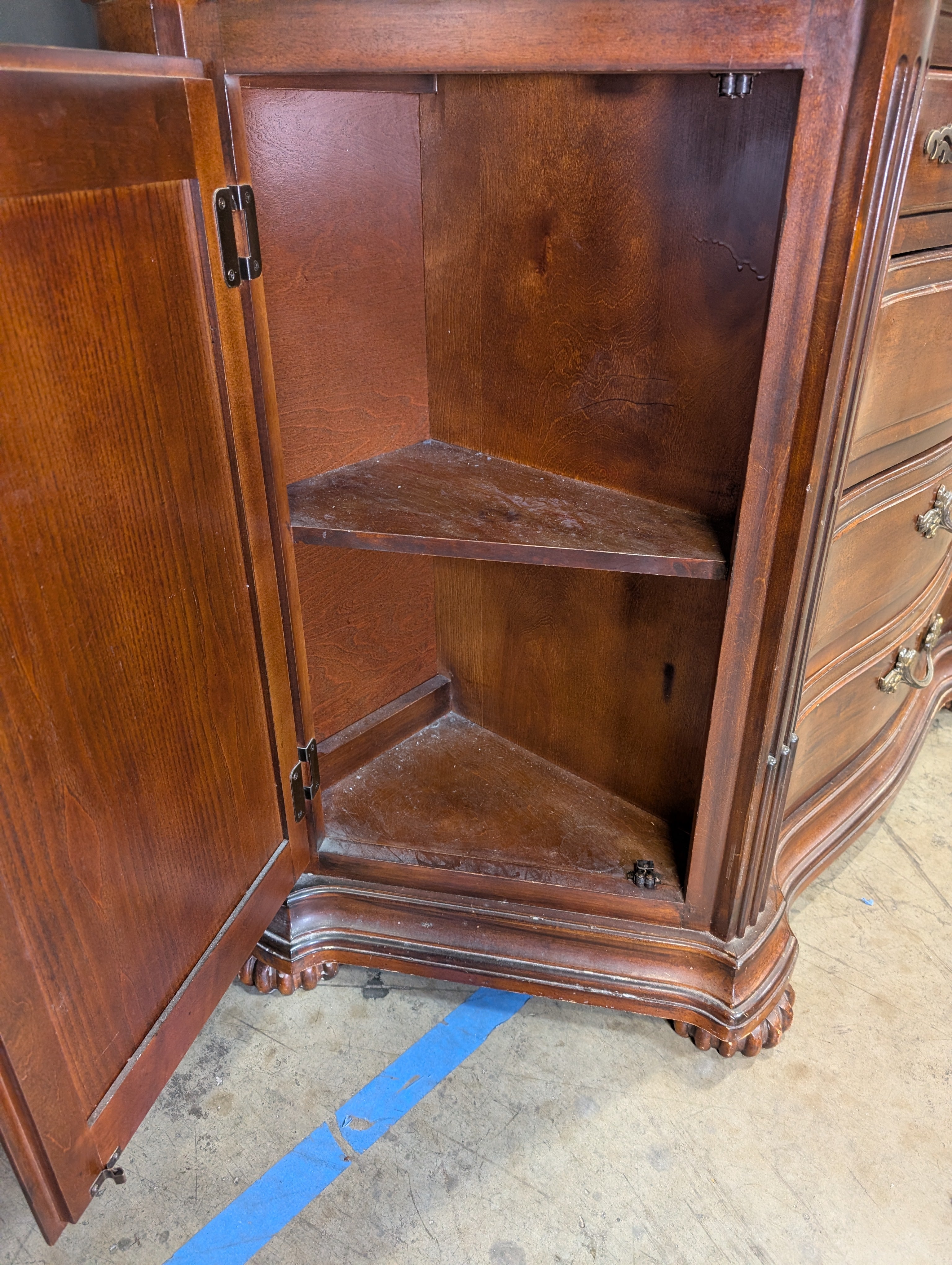 Traditional Cherry Stained Wood Dresser with Ornate Hardware
