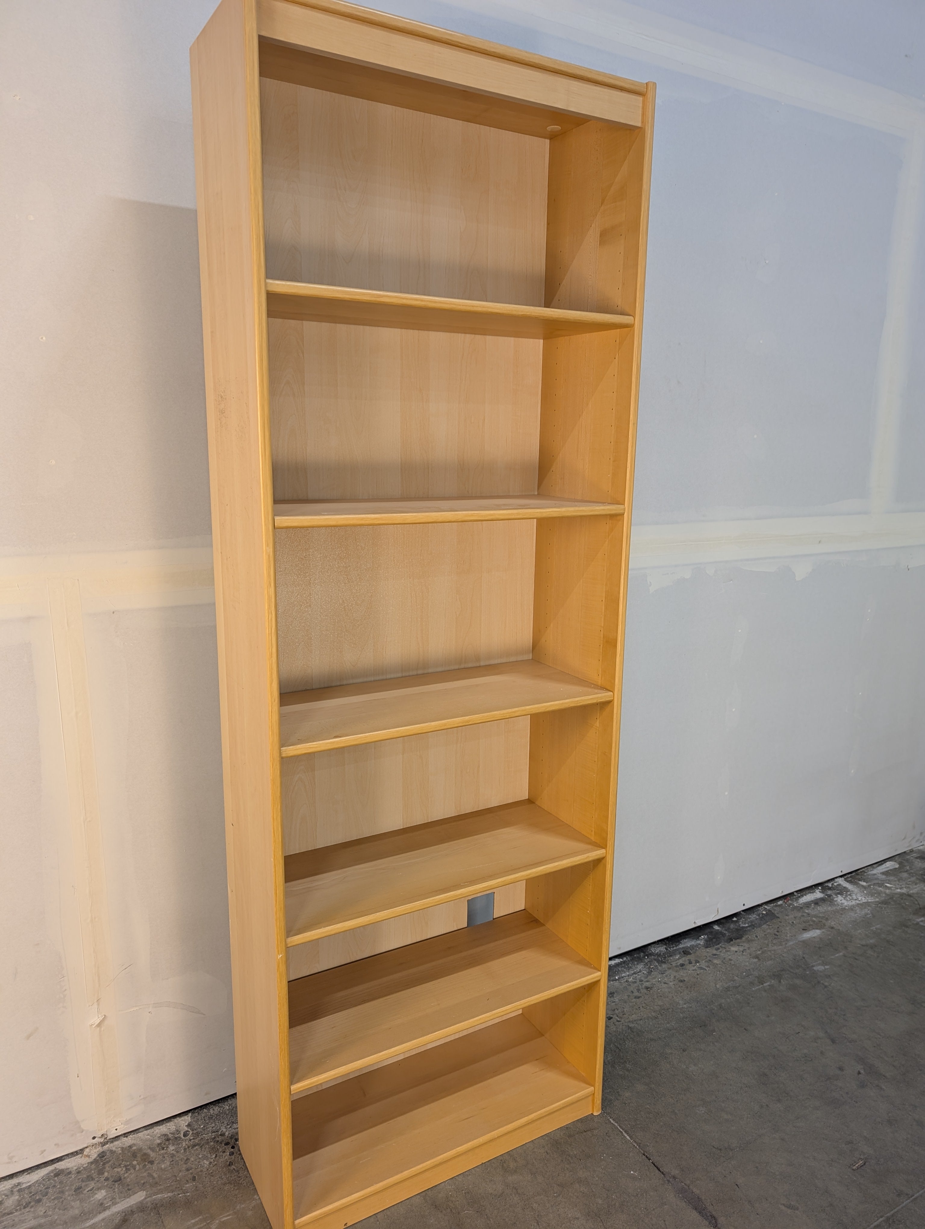 Tall Light Wood Tone Bookcase with Six Shelves