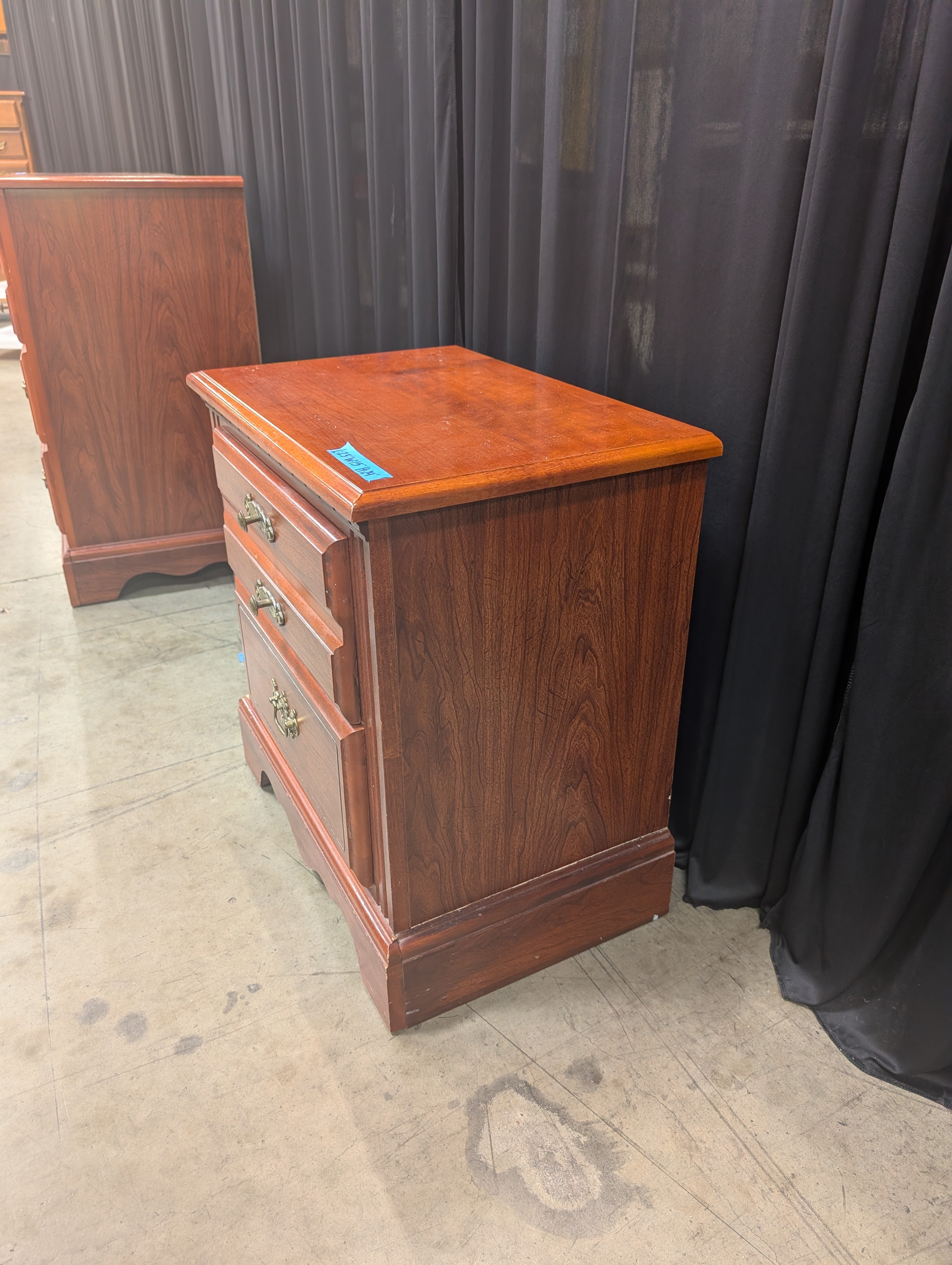 Traditional Three-Drawer Wood Nightstand with Brass Hardware