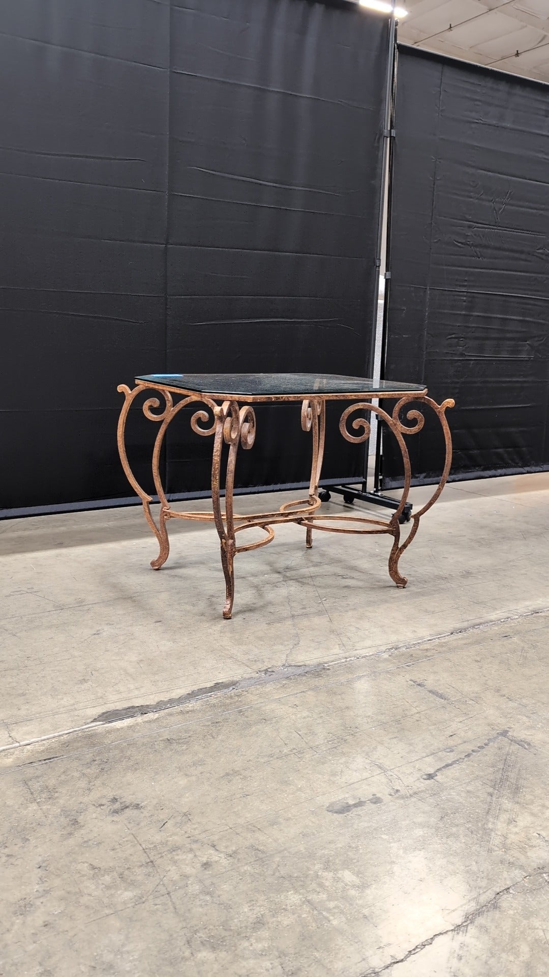 Octagonal Glass Top Accent Table with Scrollwork Metal Base
