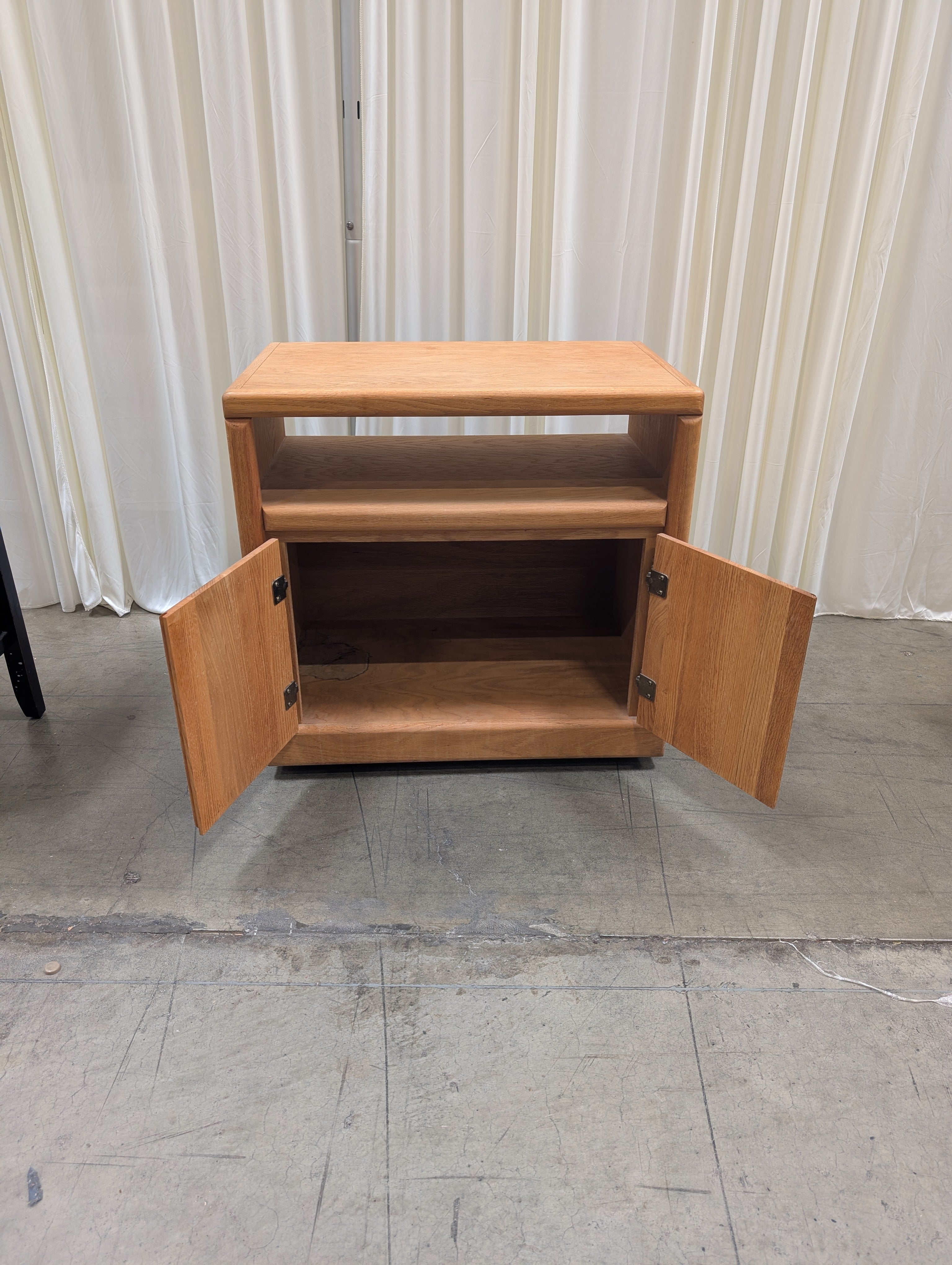 Oak Two-Door TV Stand with Open Shelf