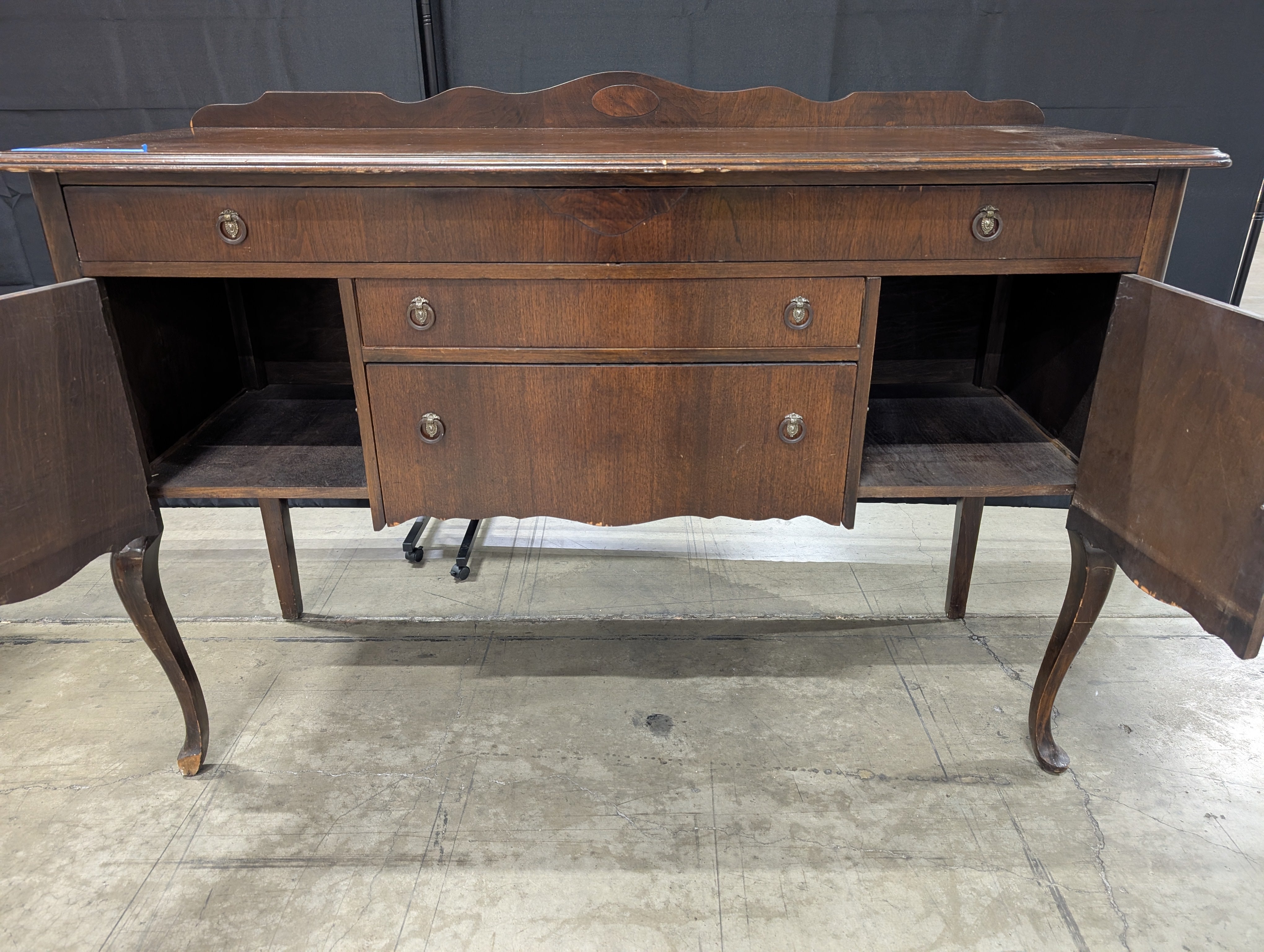 Traditional Dark Wood Buffet Cabinet with Scalloped Back