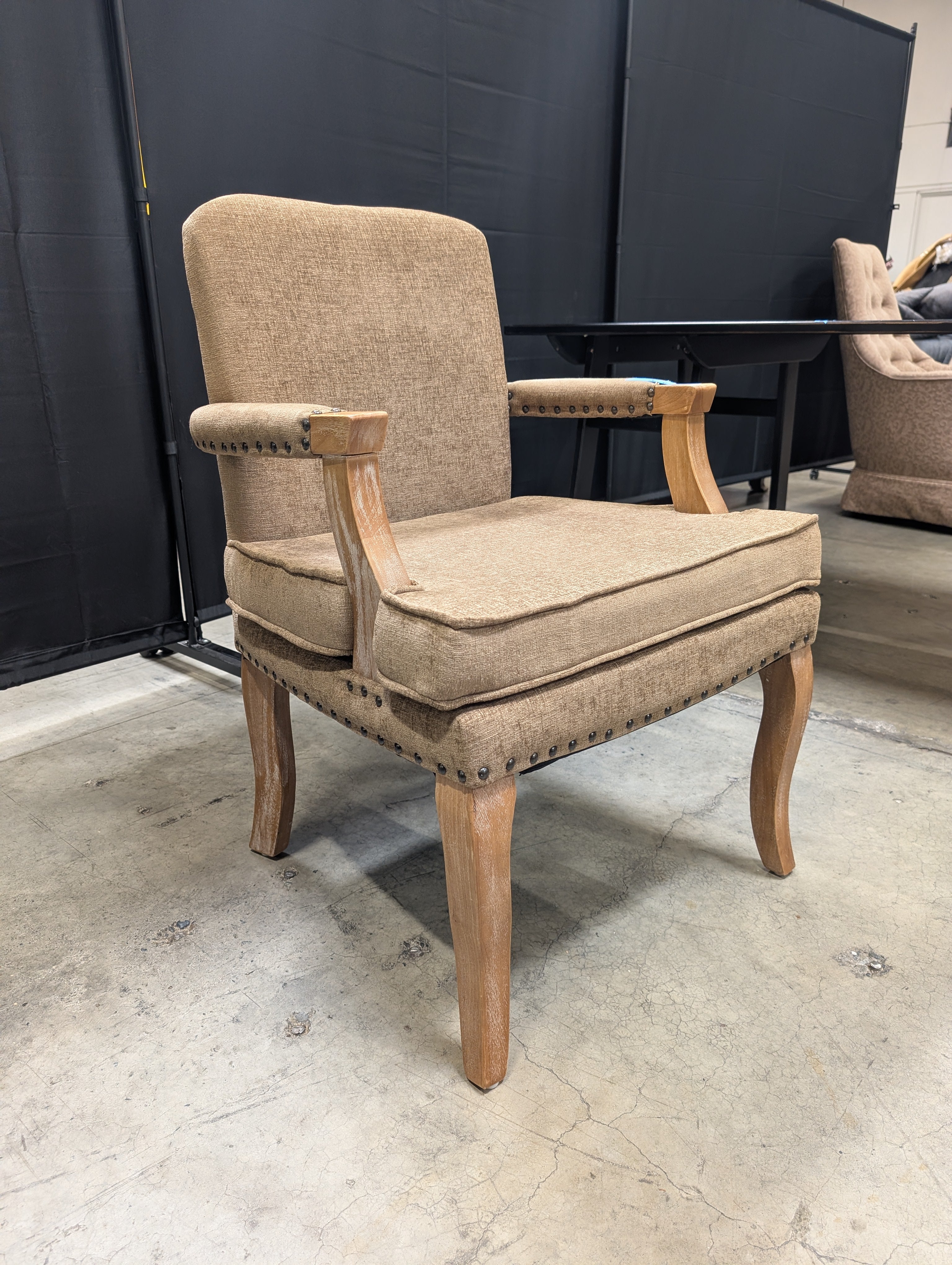Traditional Upholstered Armchair with Carved Wood Accents