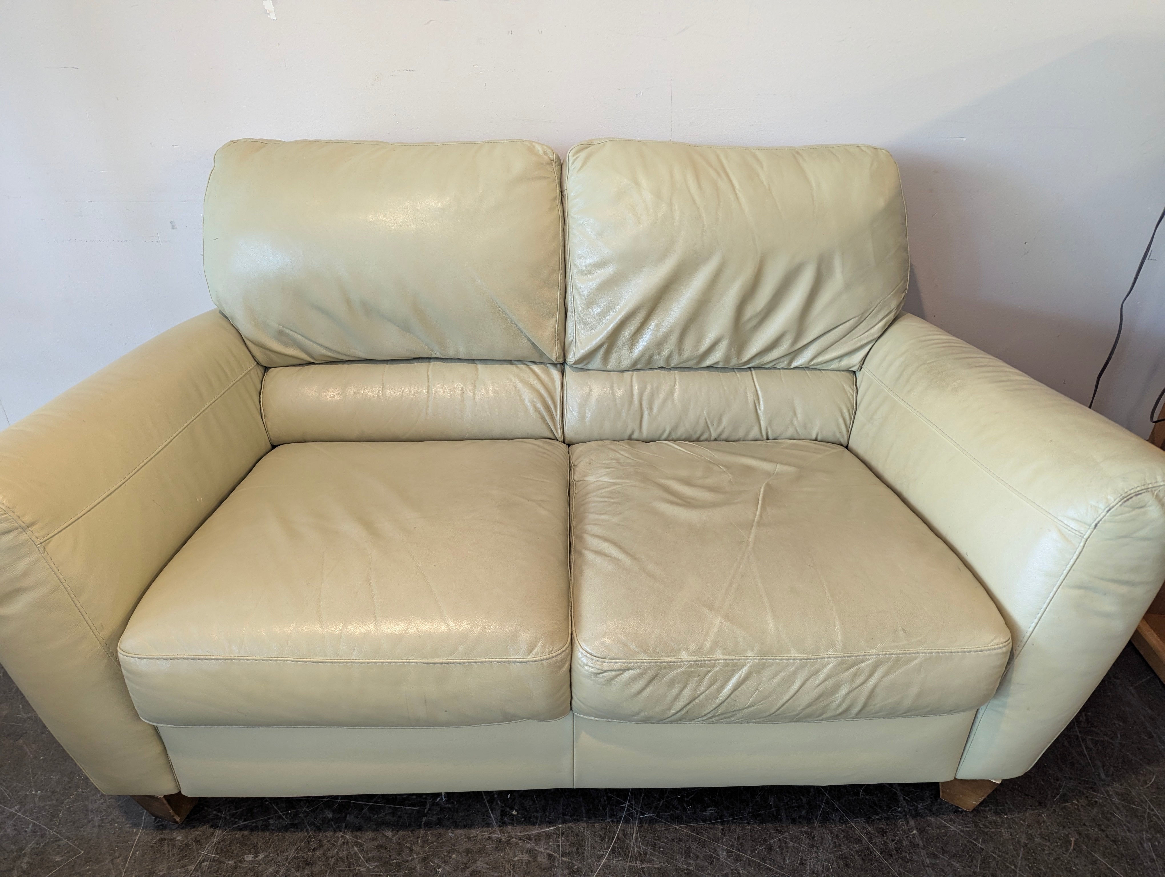 Cream Leather Loveseat