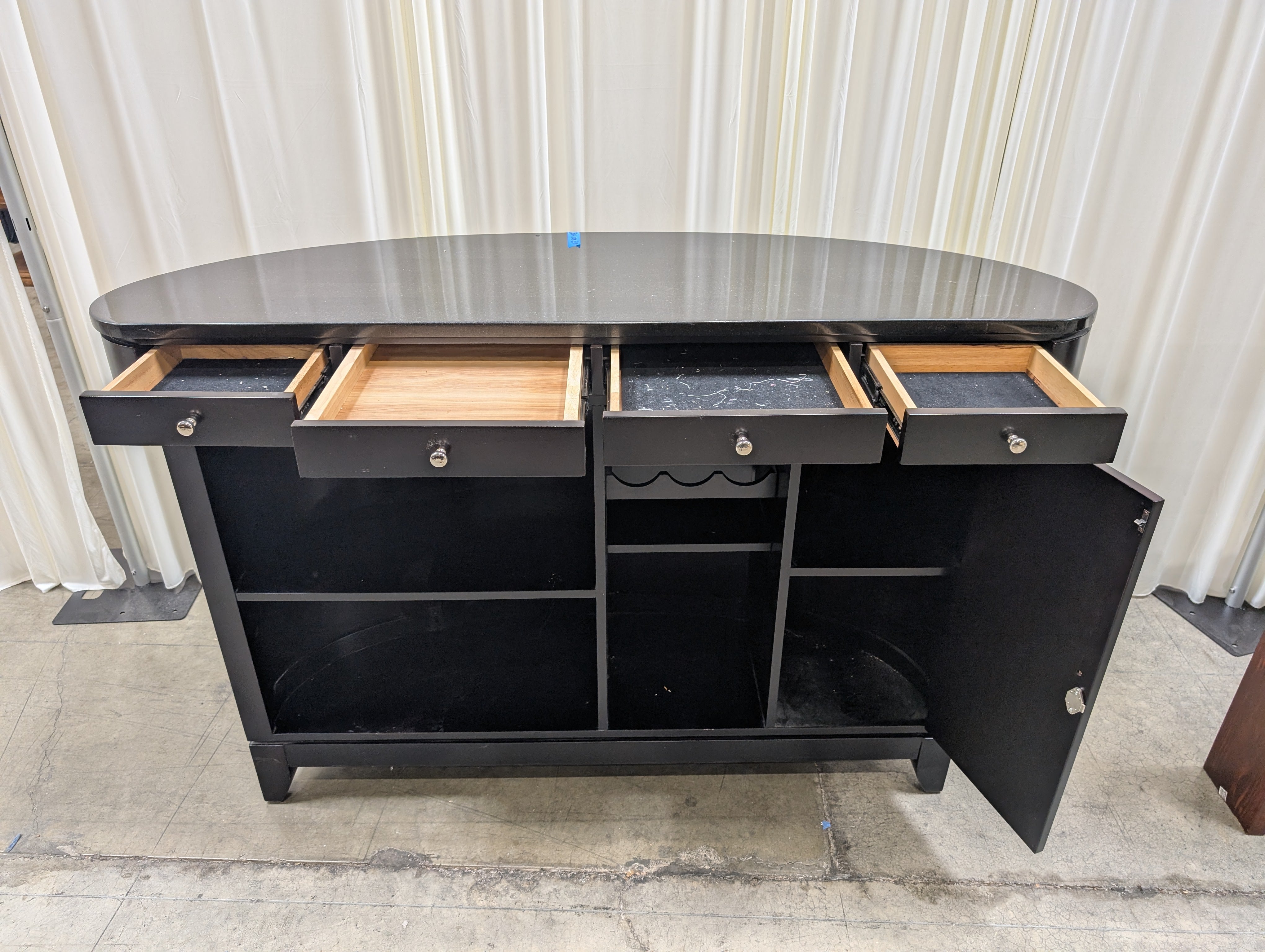 Dark Curved Wood Home Bar with Metal Foot Rail