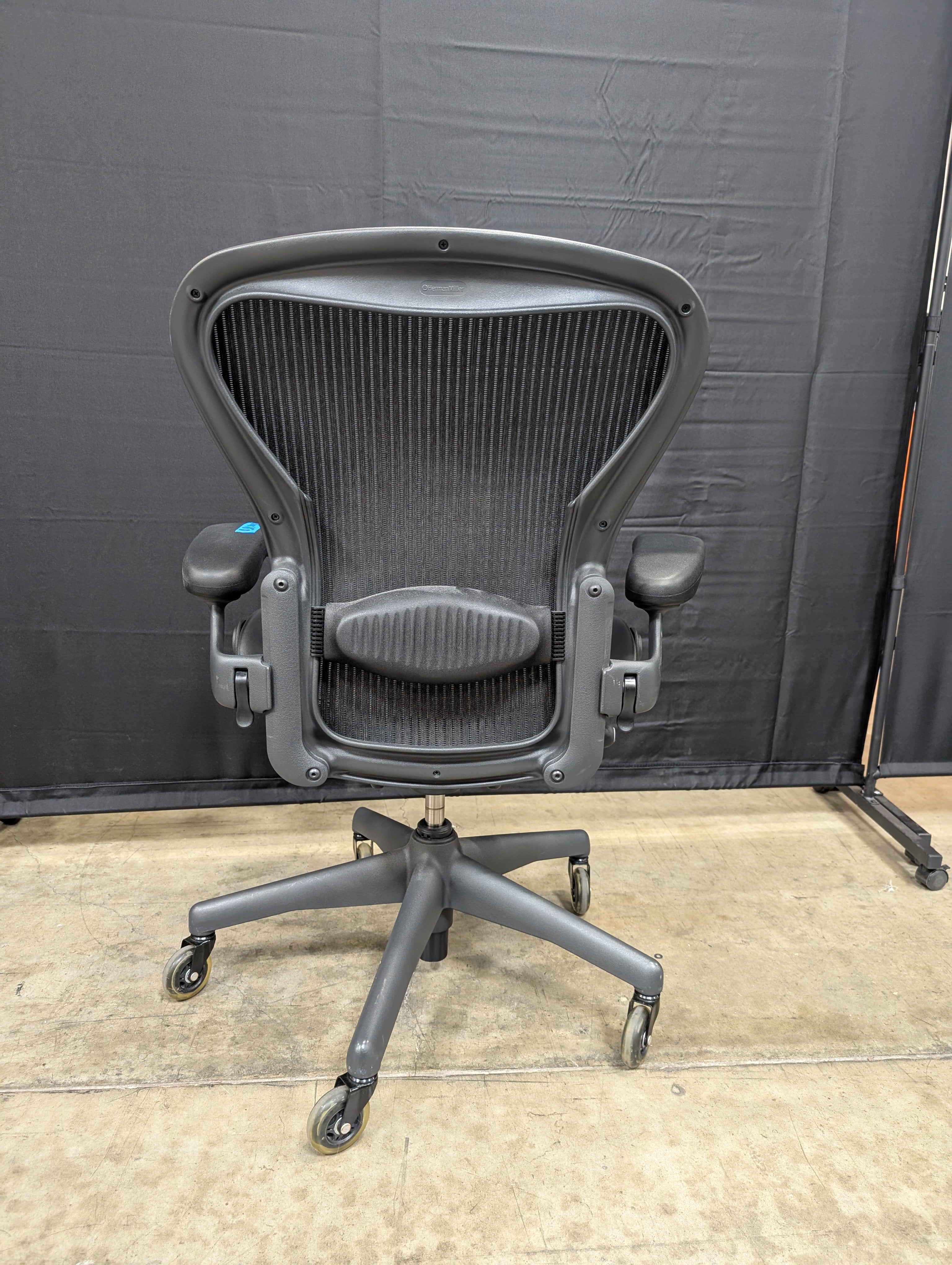 Black Mesh High-Back Herman Miller Office Chair with Headrest