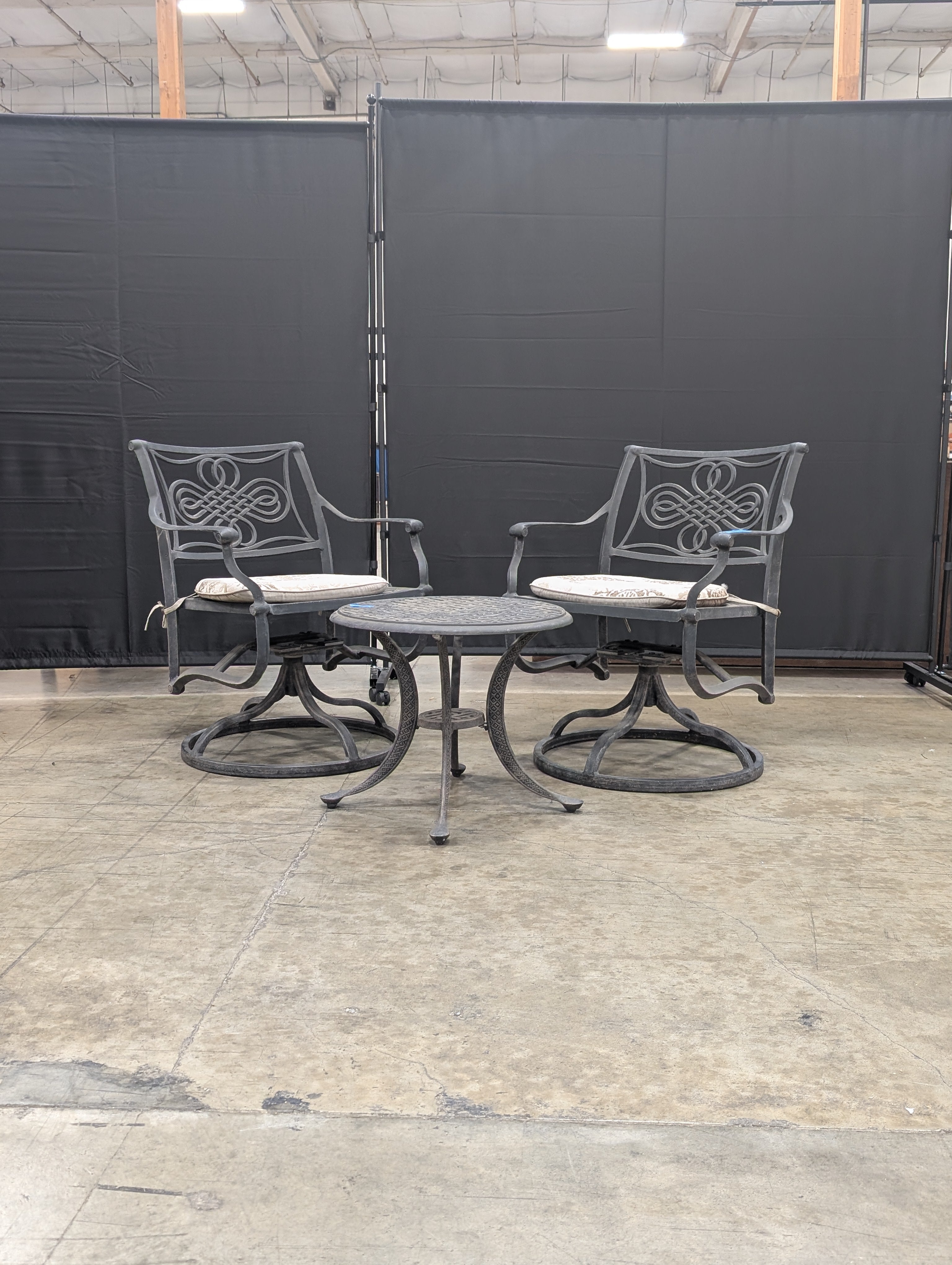 Ornate Cast Metal Outdoor Bistro Set with Swivel Chairs