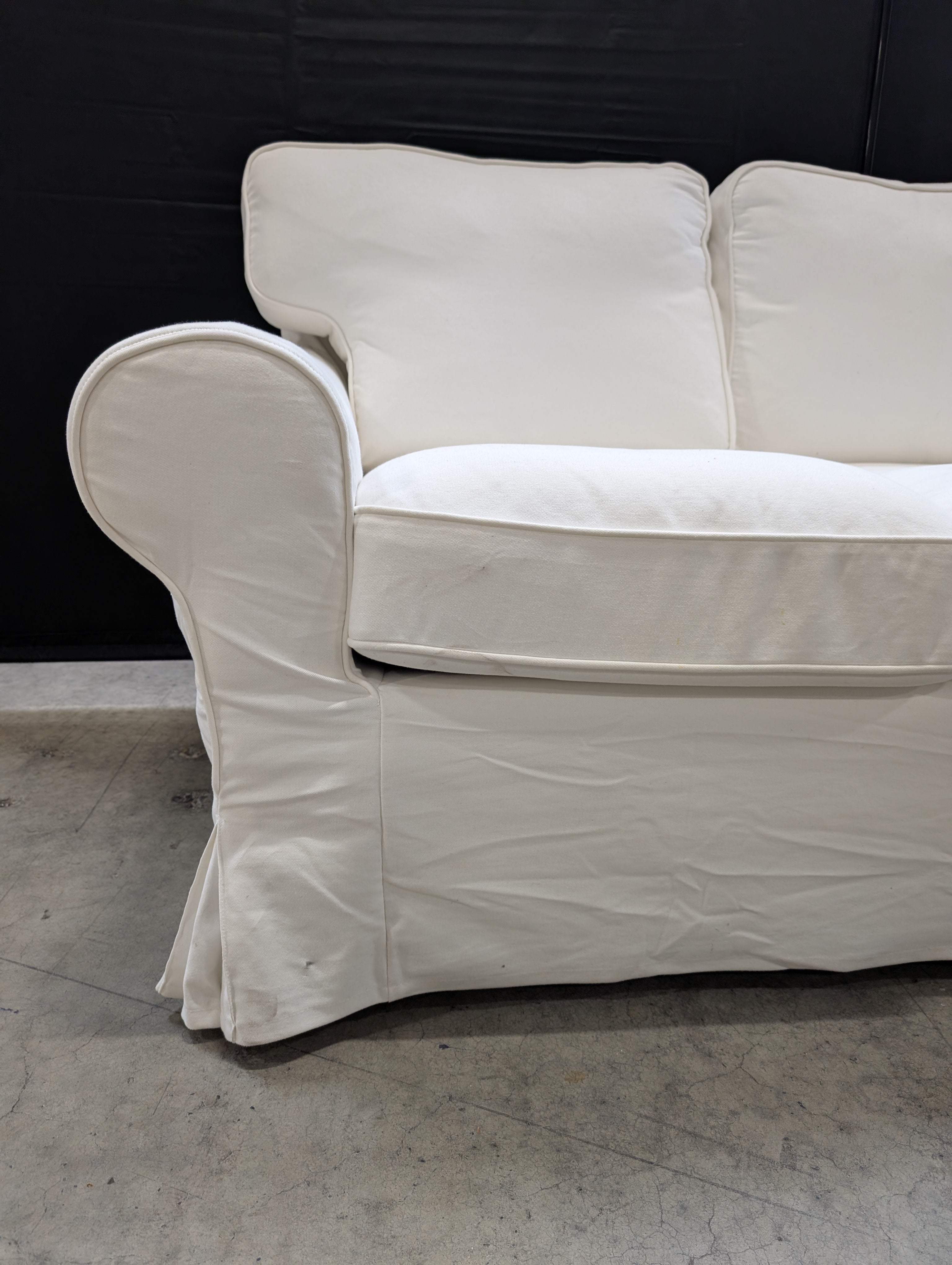 Versatile White Slipcovered Three-Seat Sofa